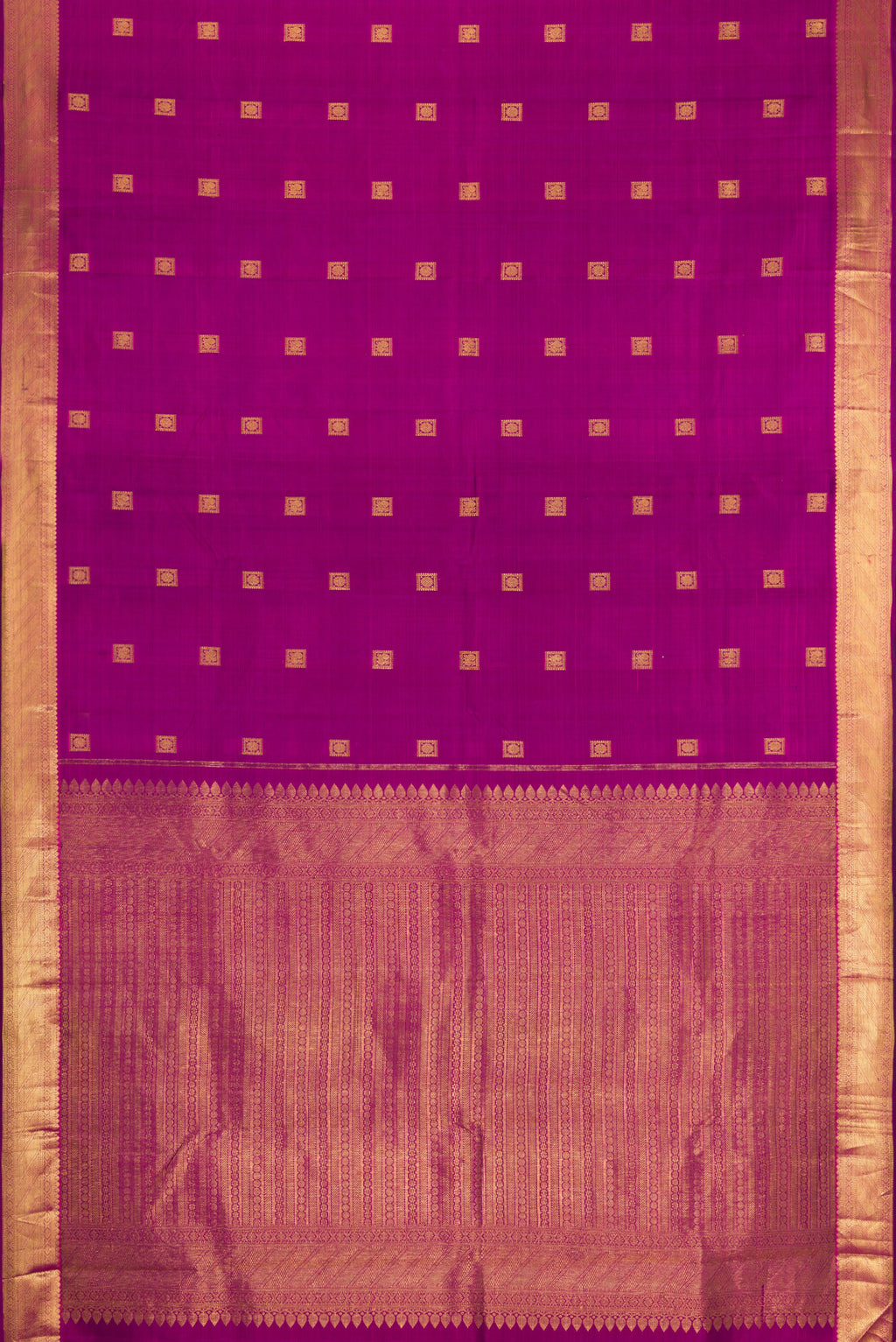 Flat view of Purple Kanjivaram Silk Saree with Zari Butta on the body and Zari Border. 