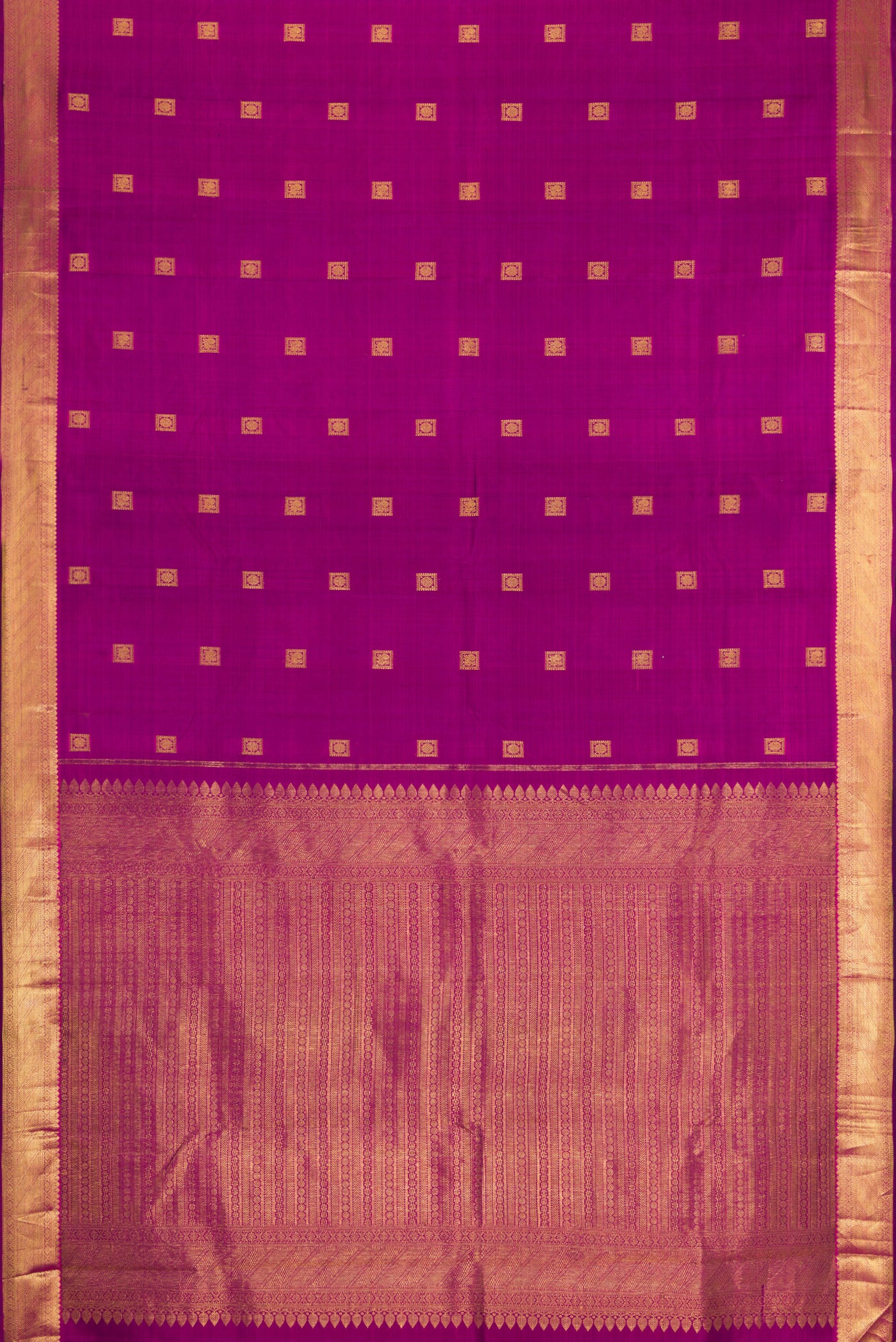 Flat view of Purple Kanjivaram Silk Saree with Zari Butta on the body and Zari Border. 