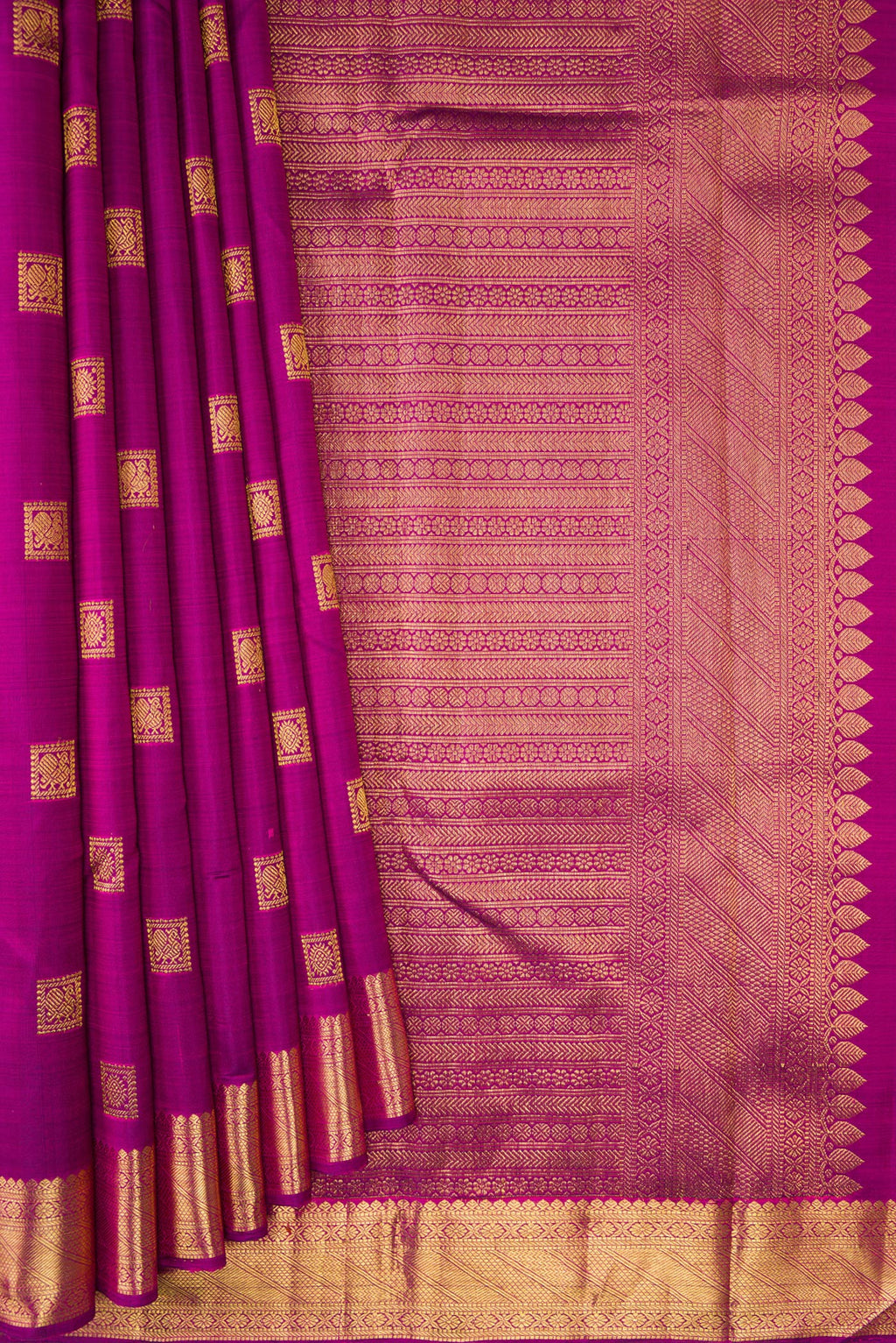 Pleats and pallu of Purple Kanjivaram Silk Saree with Zari Butta on the body and Zari Border. 