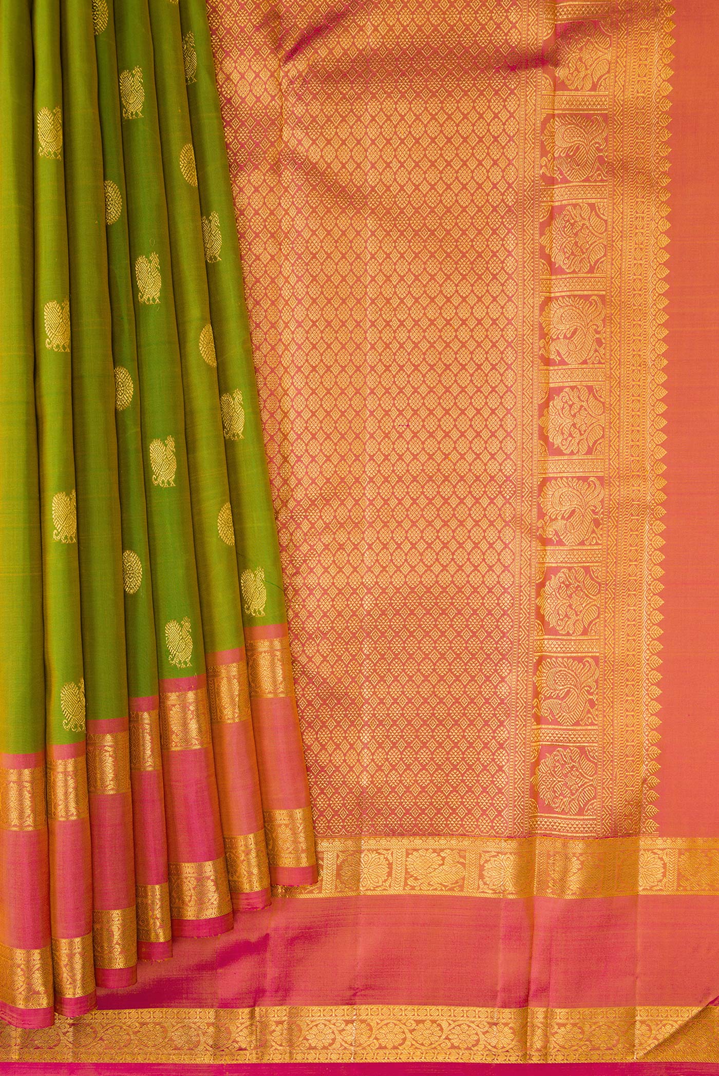 Pleats and pallu of Green Dual Tone Kanjivaram Silk Saree with Zari Butta on the body and Zari Border. 