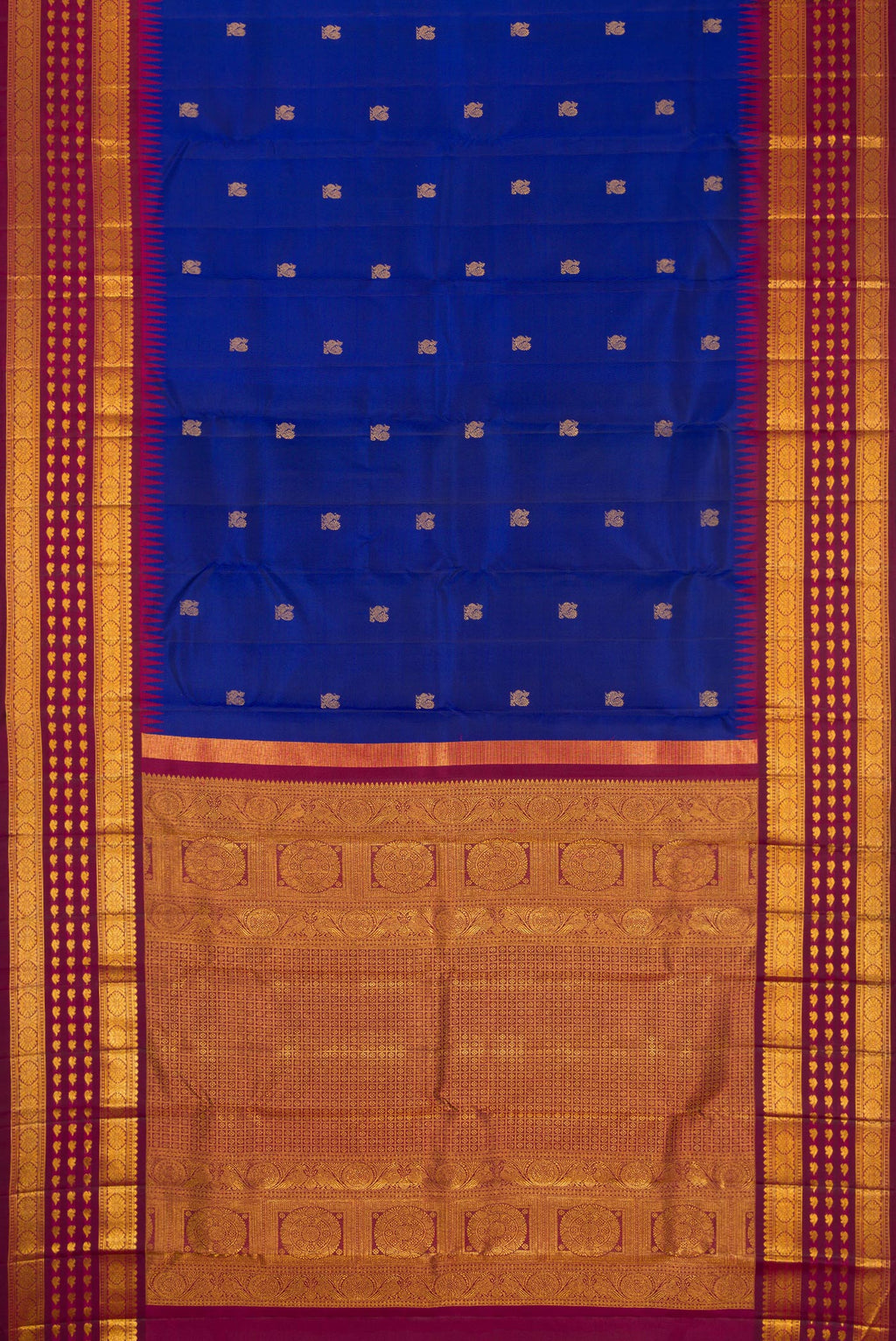 Flat view of Royal Blue Dual Tone Kanjivaram Silk Saree with Zari Butta on the body and Zari Border. 
