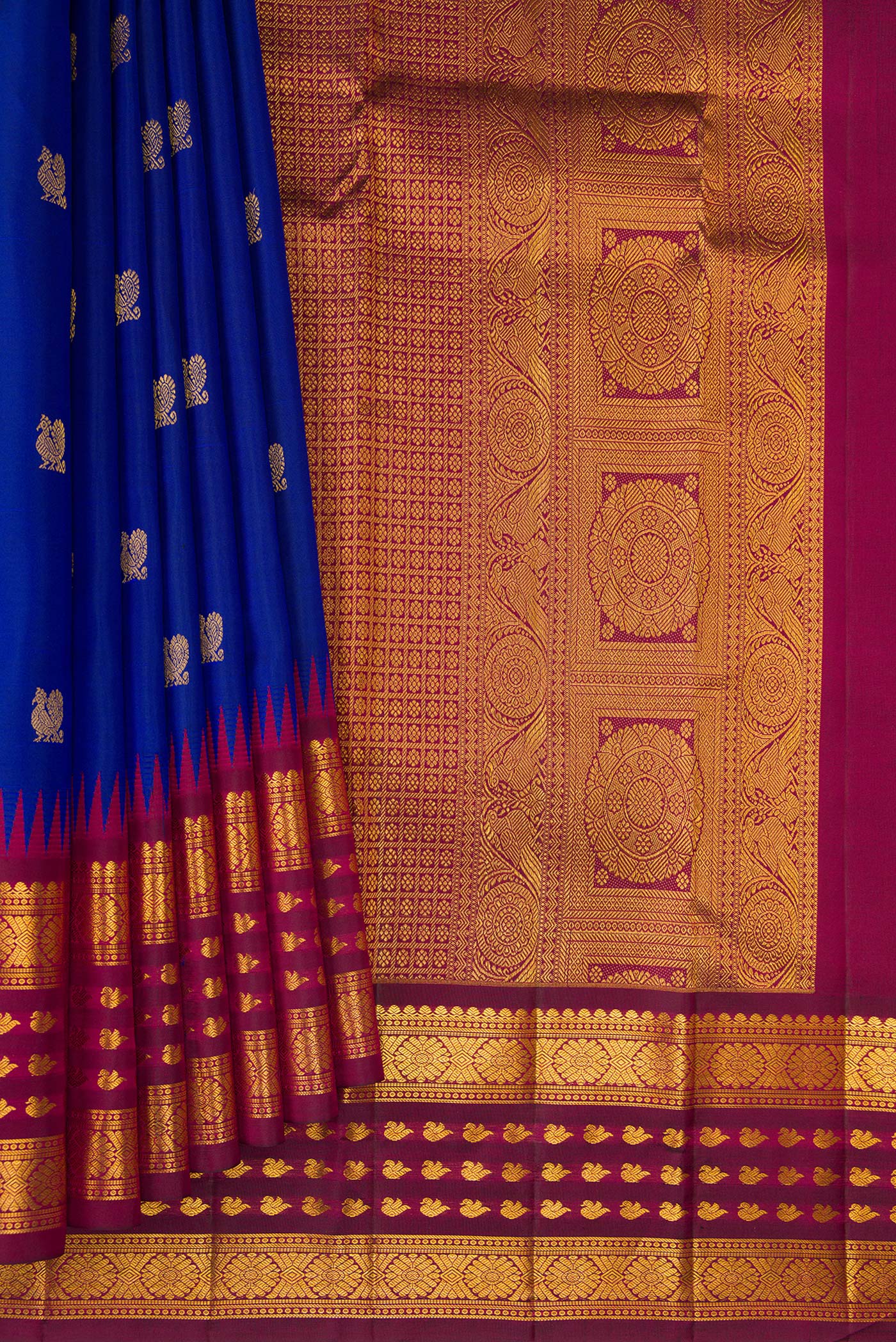 Pleats and pallu of Royal Blue Dual Tone Kanjivaram Silk Saree with Zari Butta on the body and Zari Border. 