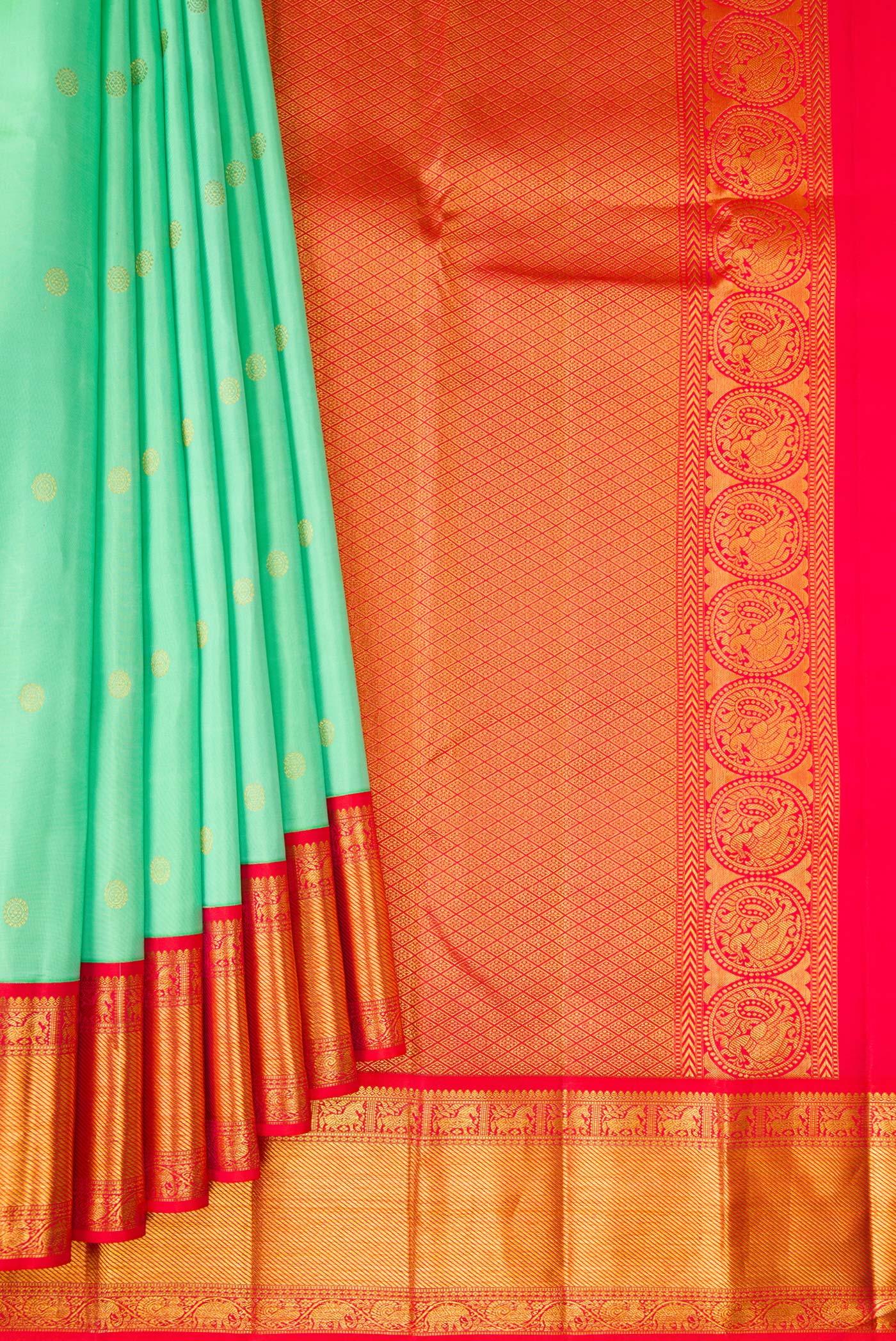 Pleats and pallu of Sea Green Kanjivaram Silk Saree with Zari Butta on the body and Ganga Jamuna Border. 