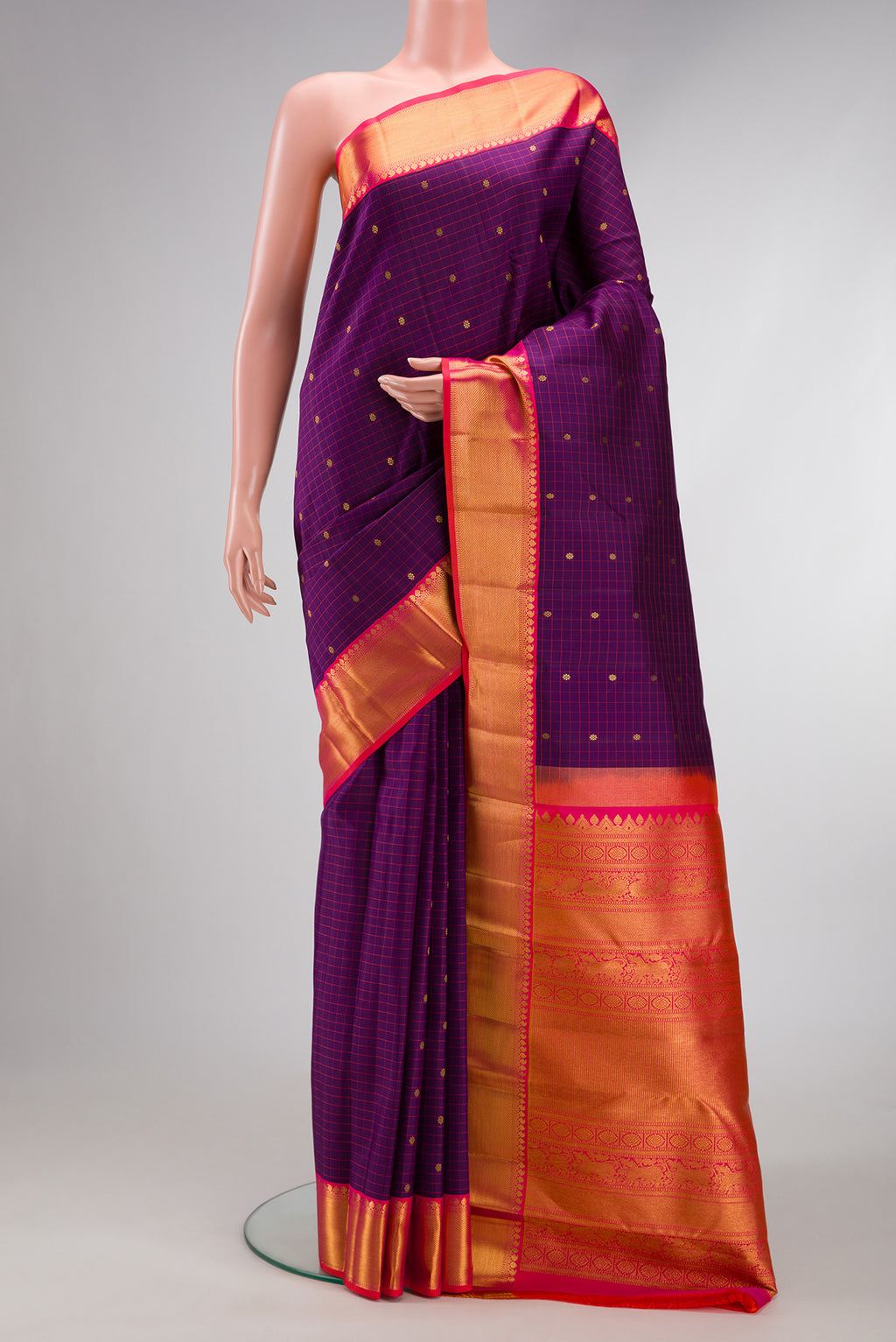 Purple Dual Tone Kanjivaram Silk Saree with Checked design on the body and Zari Border.  displayed on a mannequin