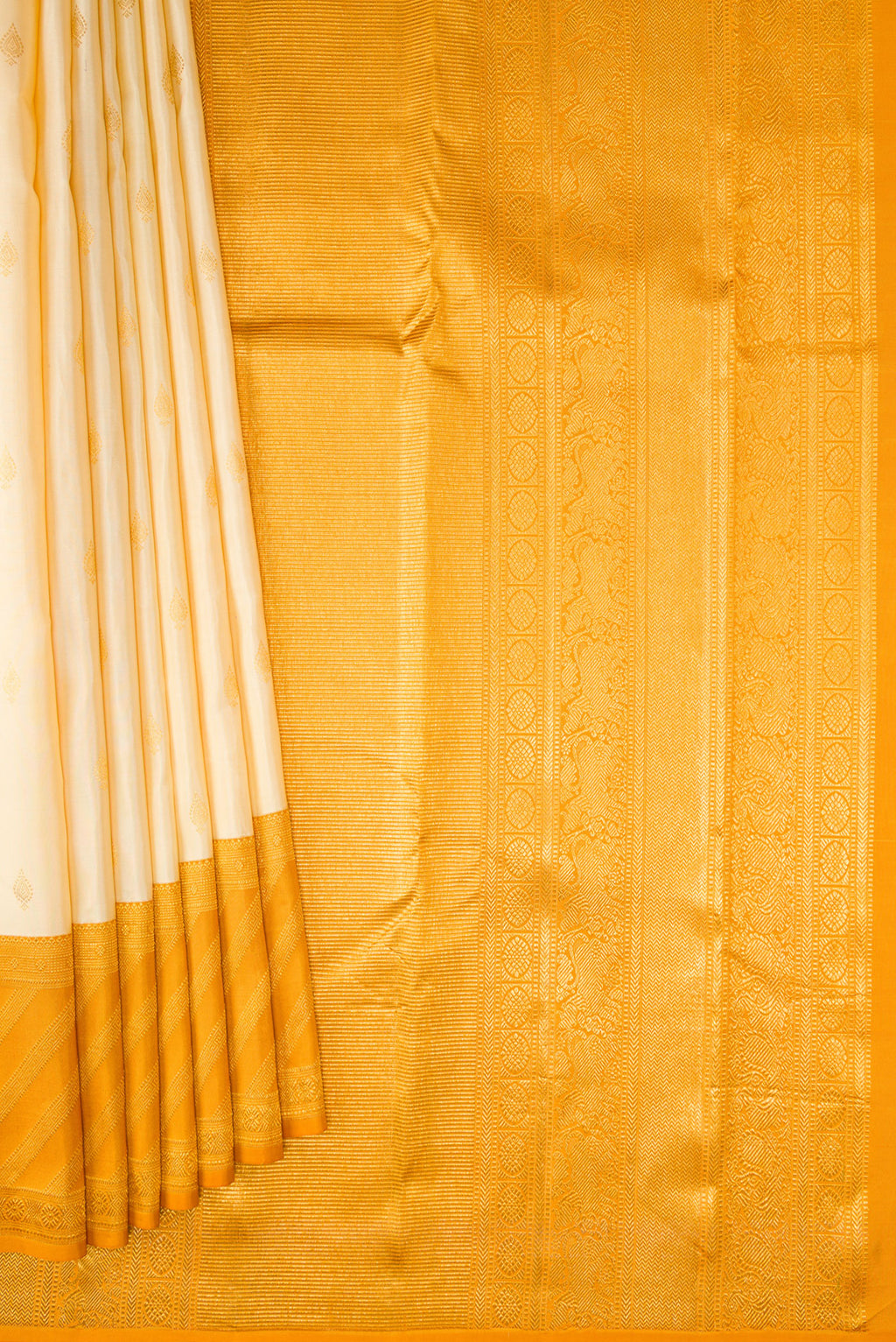Pleats and pallu of Sandal Kanjivaram Silk Saree with Zari Butta on the body and Zari Border. 