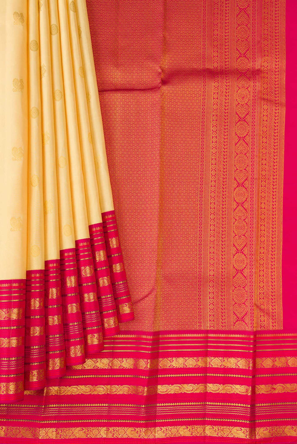 Pleats and pallu of Sandal Kanjivaram Silk Saree with Zari Butta on the body and Zari Border. 