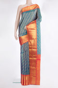 Pure Silk Peacock Blue Dual Tone Kanjivaram Saree with Zari Brocade on the body and Zari Border.  displayed on a mannequin