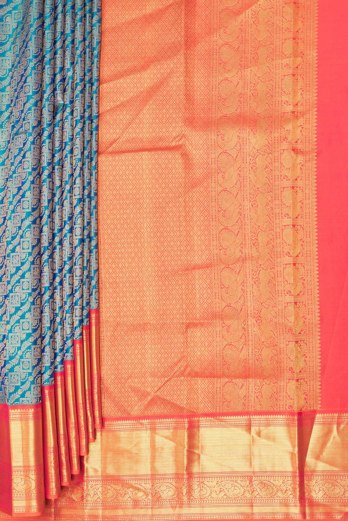 Pleats and pallu of Pure Silk Peacock Blue Dual Tone Kanjivaram Saree with Zari Brocade on the body and Zari Border. 