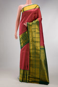 Dark Pink Kanjivaram Silk Saree with Zari Brocade on the body and Zari Border.  displayed on a mannequin