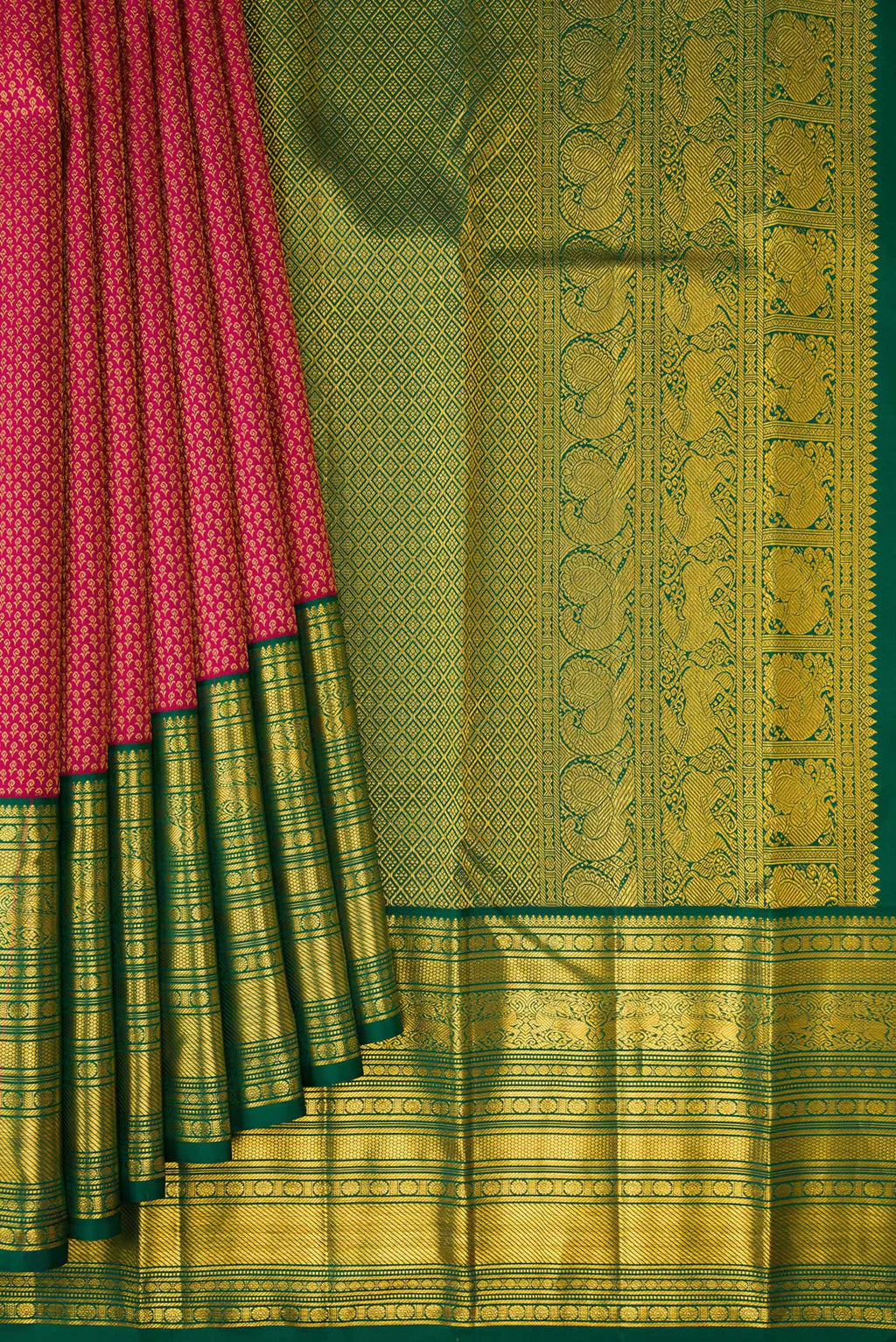 Pleats and pallu of Dark Pink Kanjivaram Silk Saree with Zari Brocade on the body and Zari Border. 