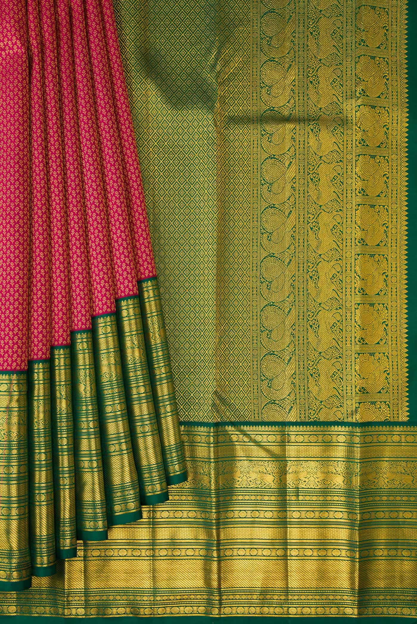 Pleats and pallu of Dark Pink Kanjivaram Silk Saree with Zari Brocade on the body and Zari Border. 