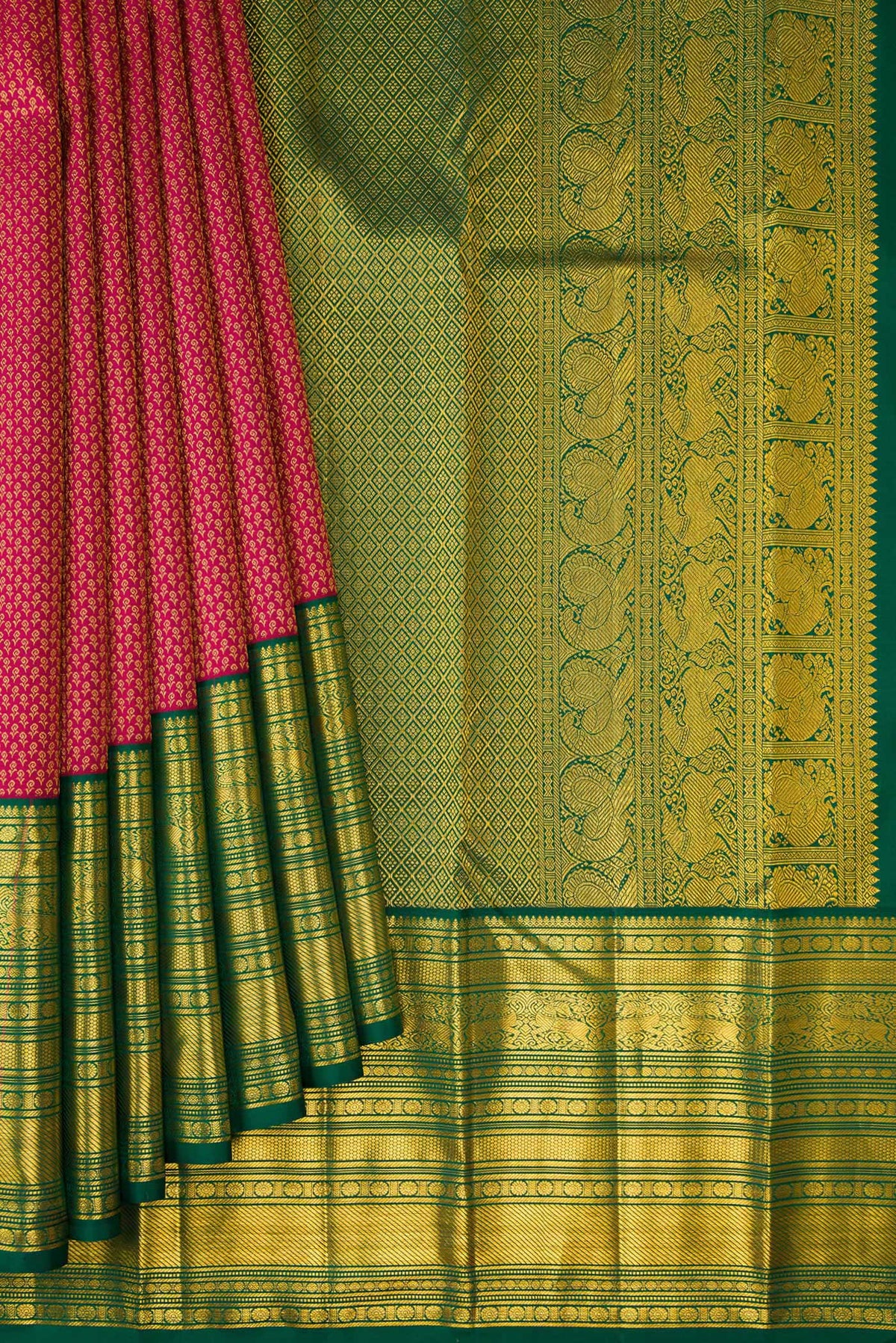 Pleats and pallu of Dark Pink Kanjivaram Silk Saree with Zari Brocade on the body and Zari Border. 