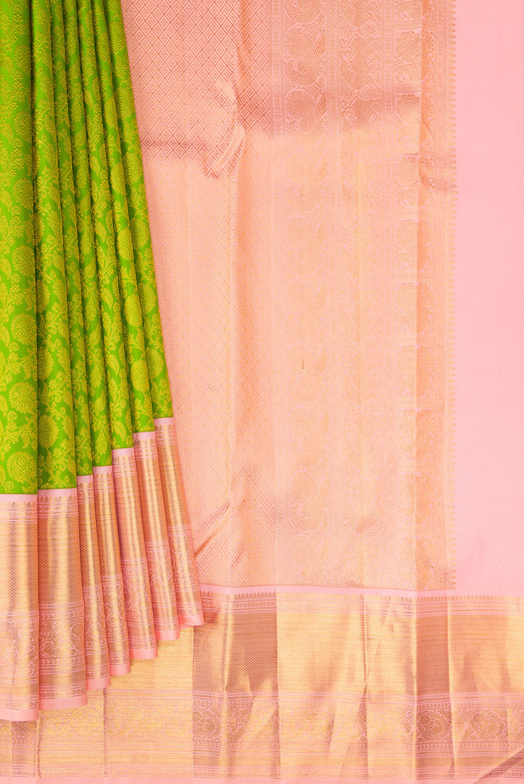 Pleats and pallu of Pure Silk Parrot Green Kanjivaram Saree with Zari Brocade on the body and Zari Border. 