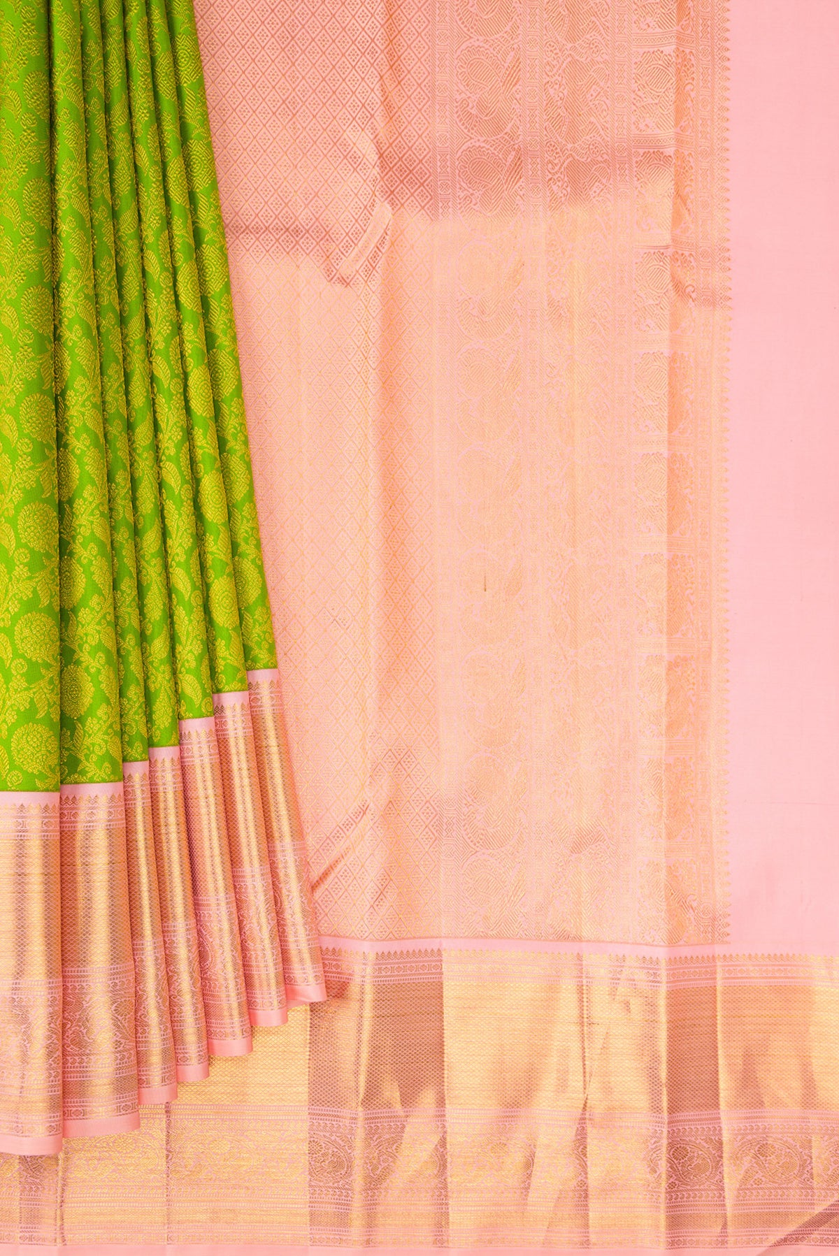 Pleats and pallu of Pure Silk Parrot Green Kanjivaram Saree with Zari Brocade on the body and Zari Border. 