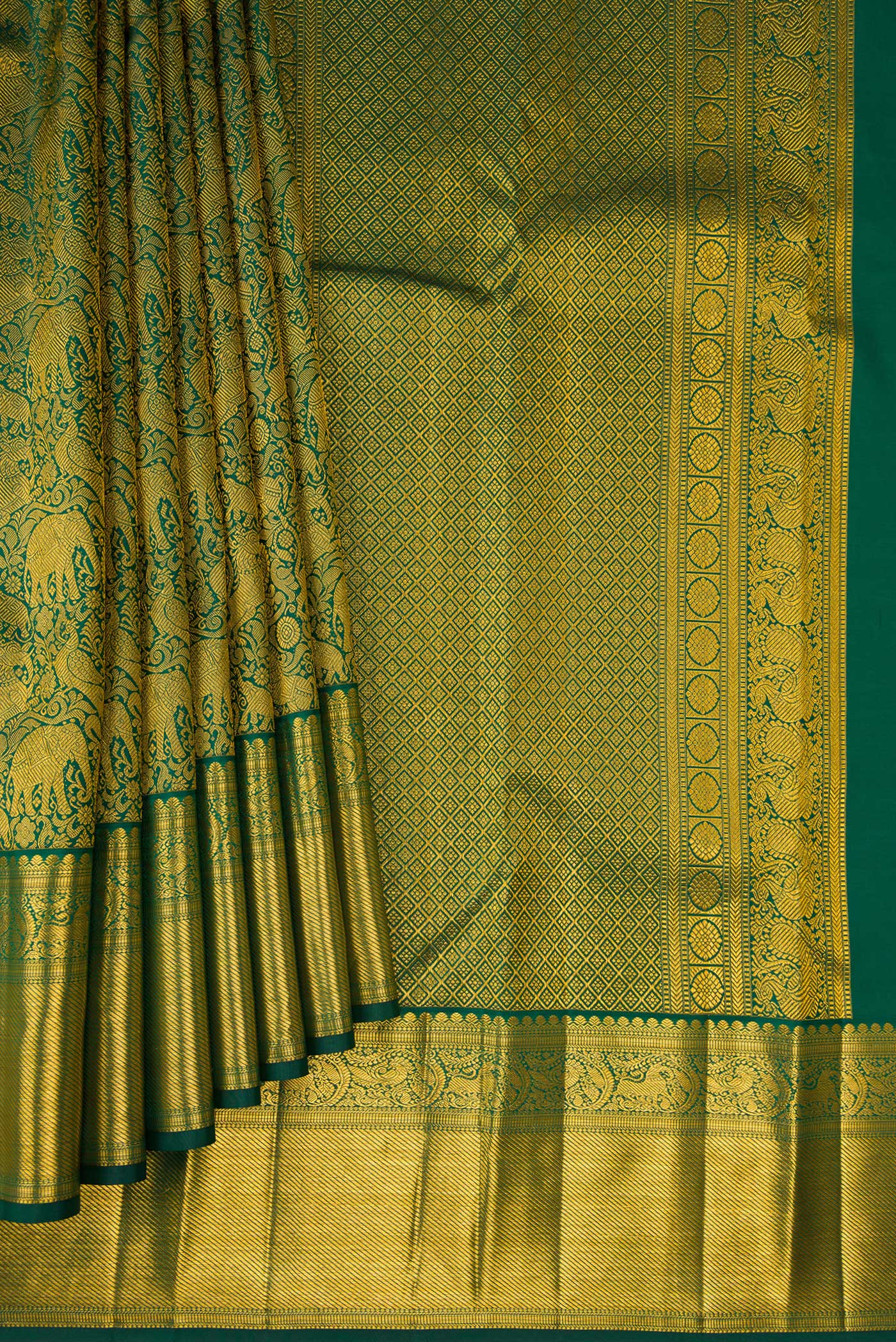 Pleats and pallu of Green Kanjivaram Silk Saree with Zari Brocade on the body and Zari Border. 