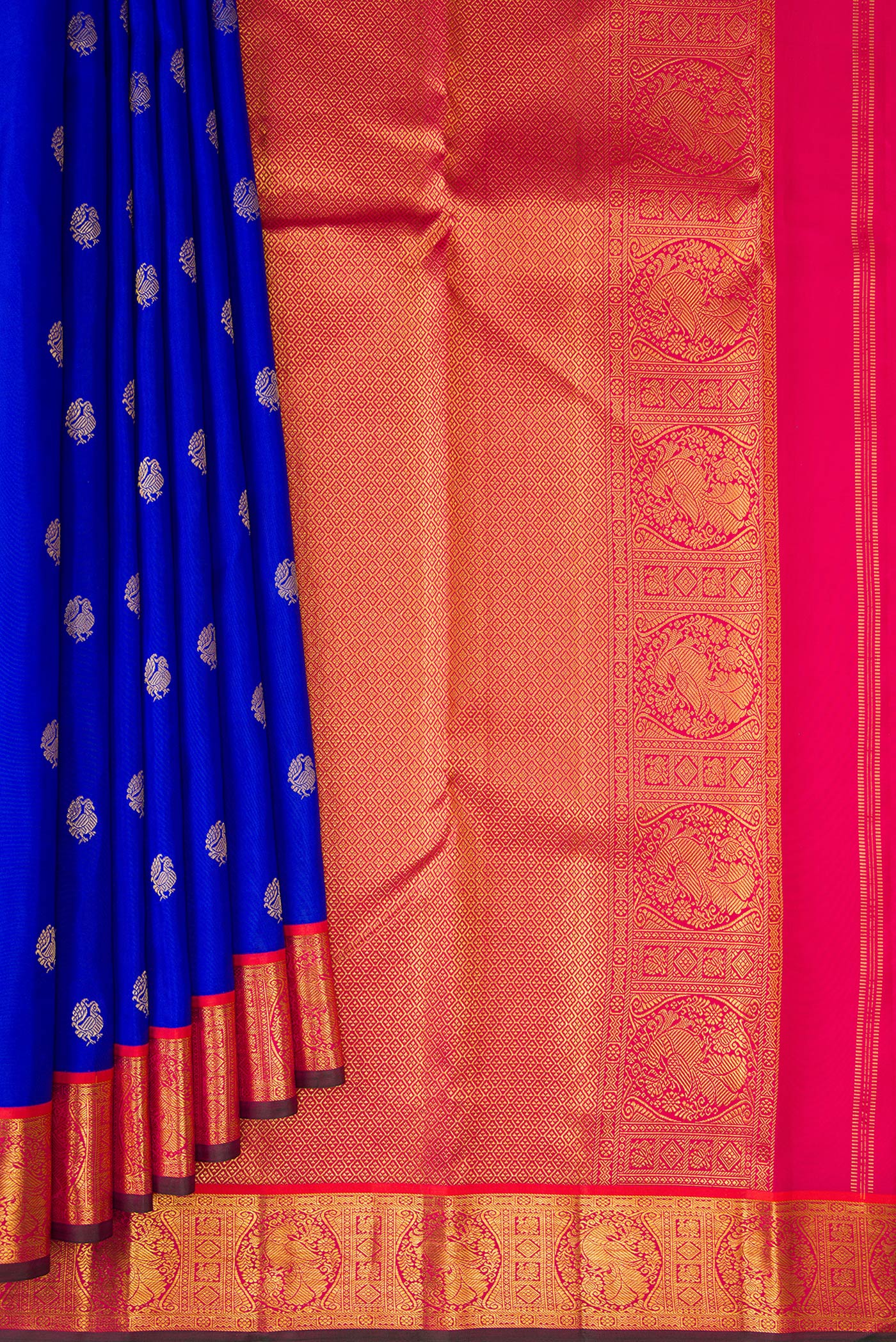Pleats and pallu of Royal Blue Kanchipuram Silk Saree with Zari Butta on the body and Zari Border. 
