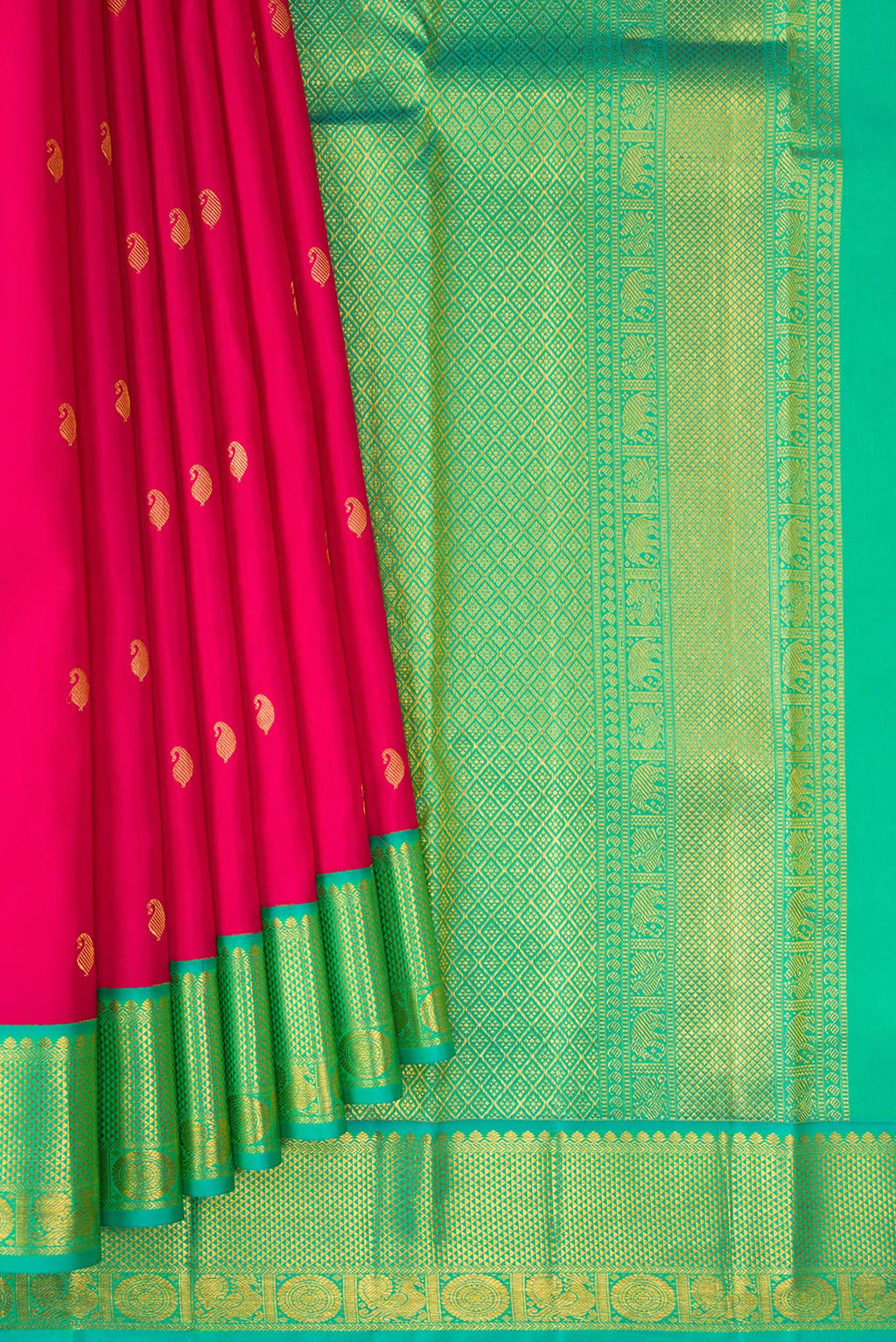 Pleats and pallu of Dark Pink Kanchipuram Silk Saree with Zari Butta on the body and Zari Border. 
