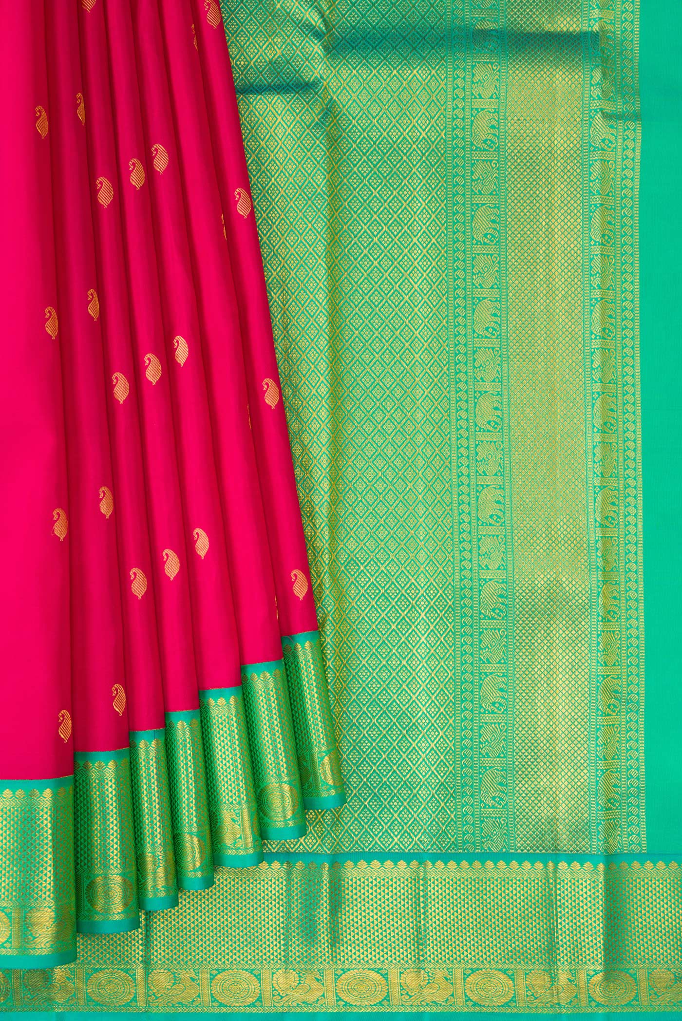 Pleats and pallu of Dark Pink Kanchipuram Silk Saree with Zari Butta on the body and Zari Border. 