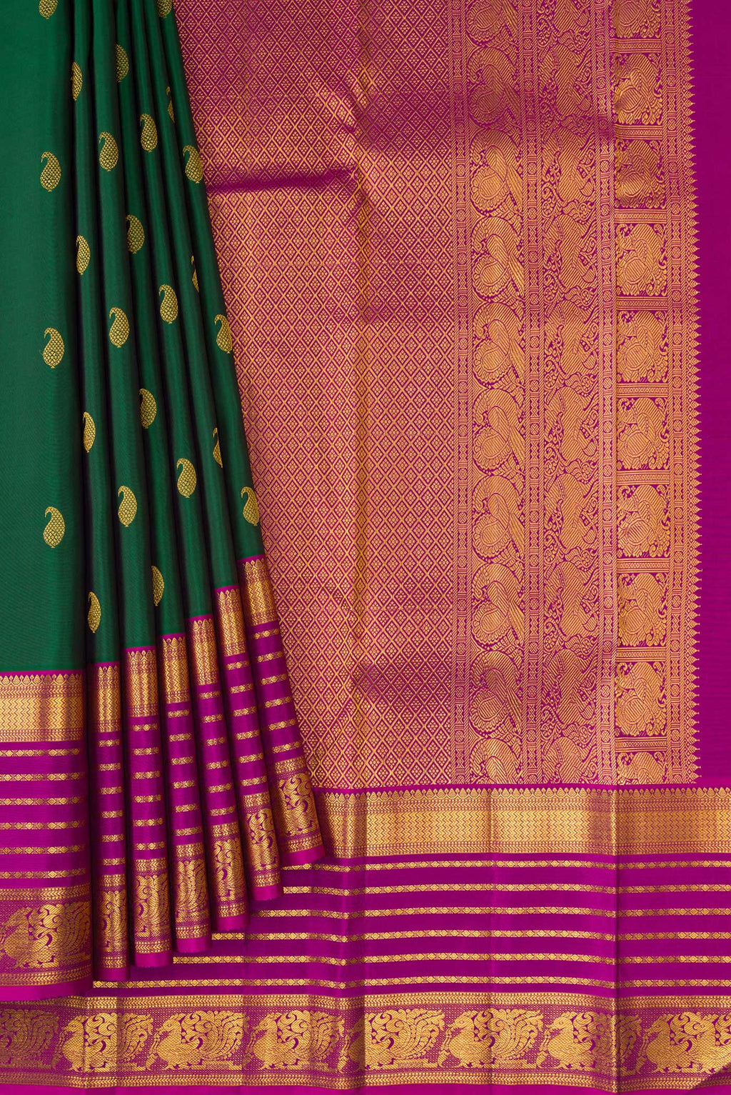 Pleats and pallu of Bottle Green Kanchipuram Silk Saree with Zari Butta on the body and Zari Border. 