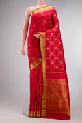 Pure Silk Pure Zari Red Kanjivaram Saree with Checked design on the body and Zari Border.  displayed on a mannequin