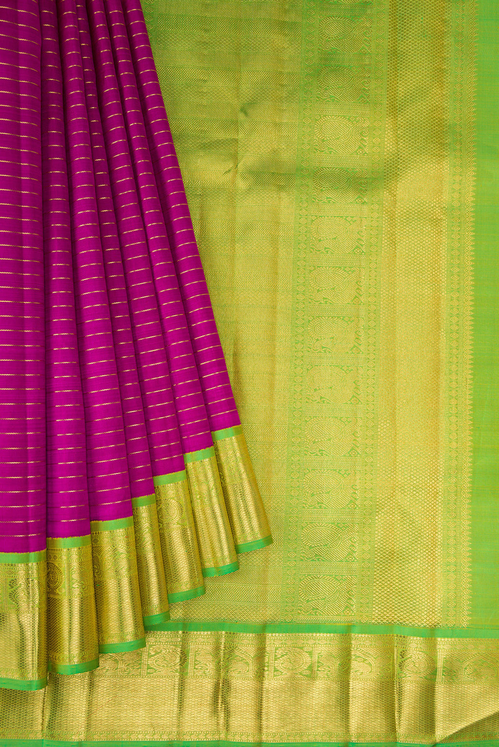 Pleats and pallu of Pure Silk Pure Zari Magenta Dual Tone Kanjivaram Saree with Stripes on the body and Zari Border. 