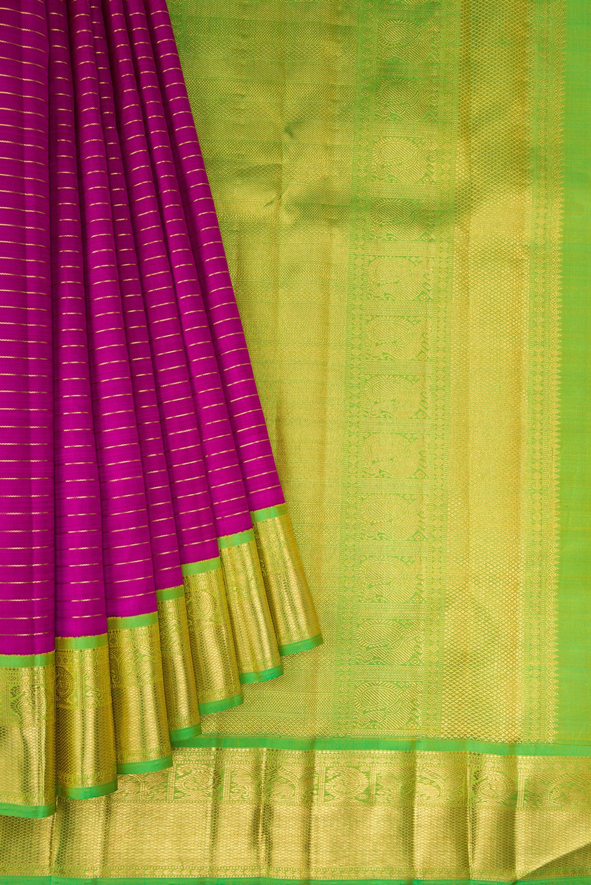 Pleats and pallu of Pure Silk Pure Zari Magenta Dual Tone Kanjivaram Saree with Stripes on the body and Zari Border. 