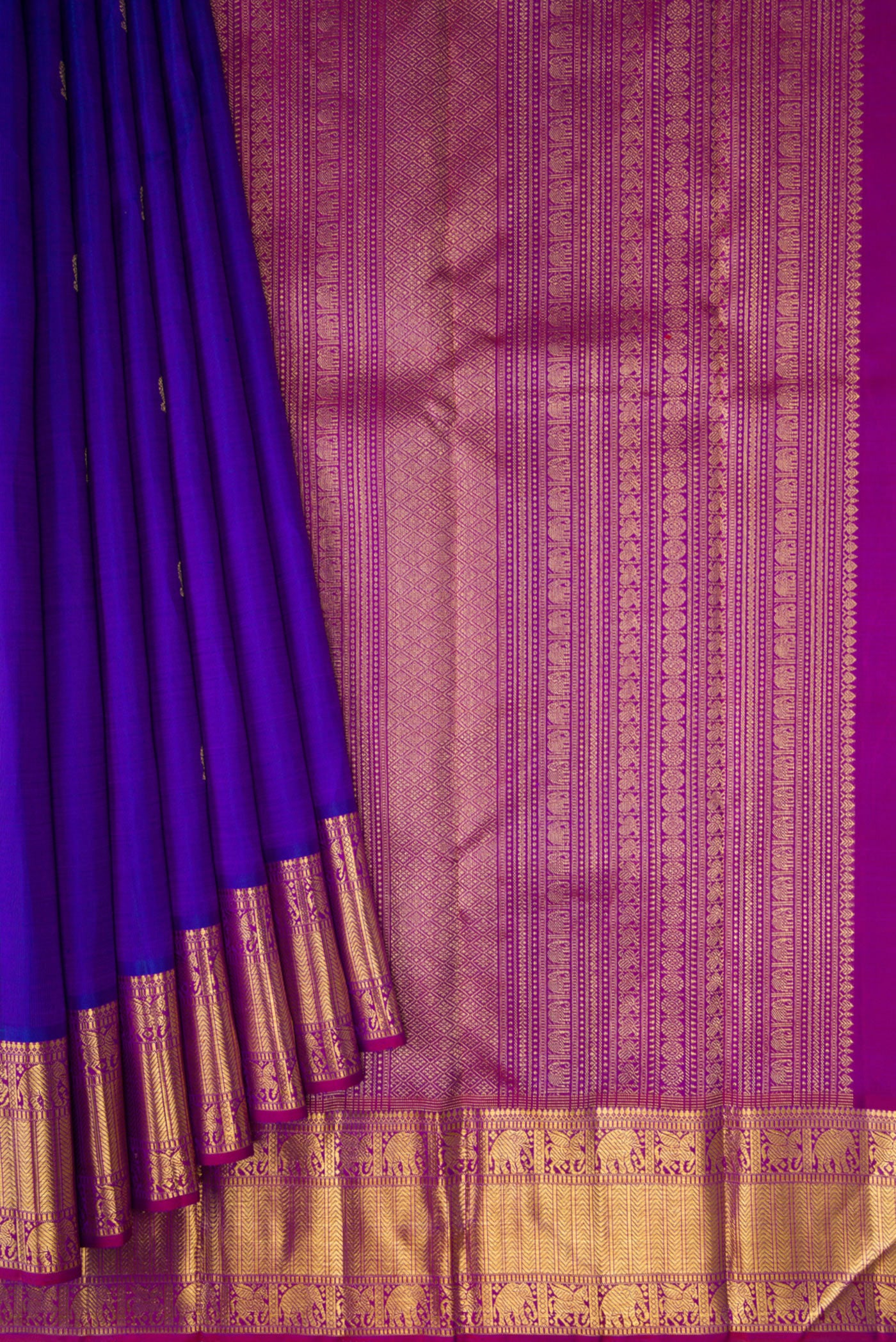Pleats and pallu of Pure Silk Pure Zari Royal Blue Kanjivaram Saree with Zari Butta on the body and Zari Border. 
