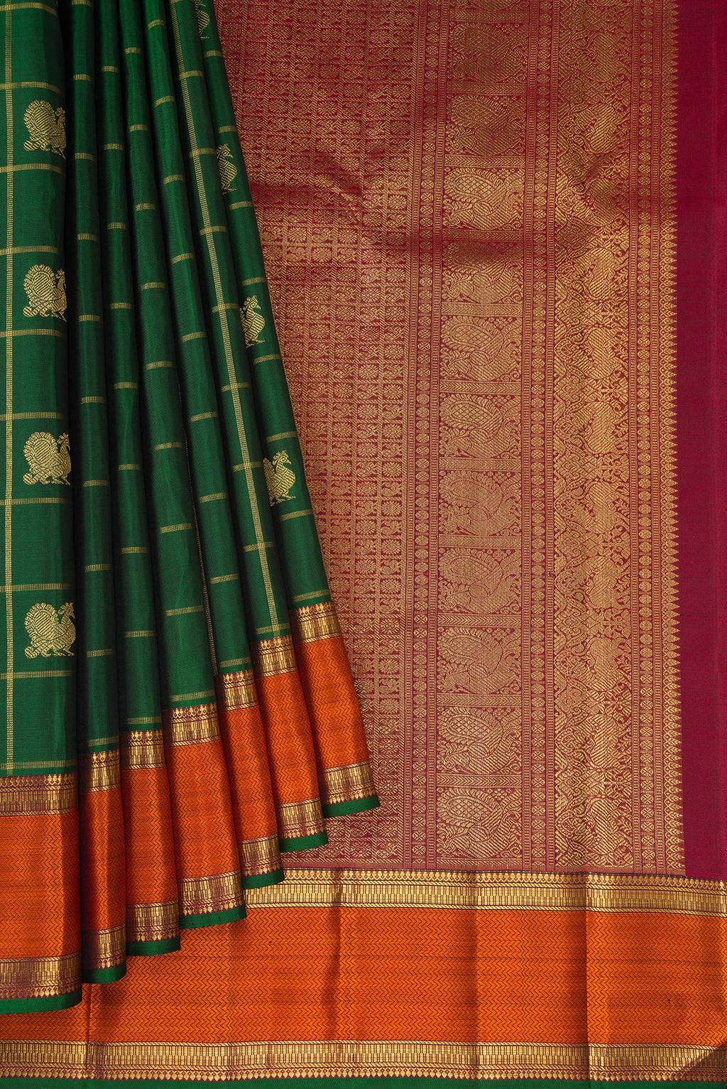 Pleats and pallu of Pure Silk Pure Zari Bottle Green Kanjivaram Saree with Checked design on the body and Zari And Thread Border. 