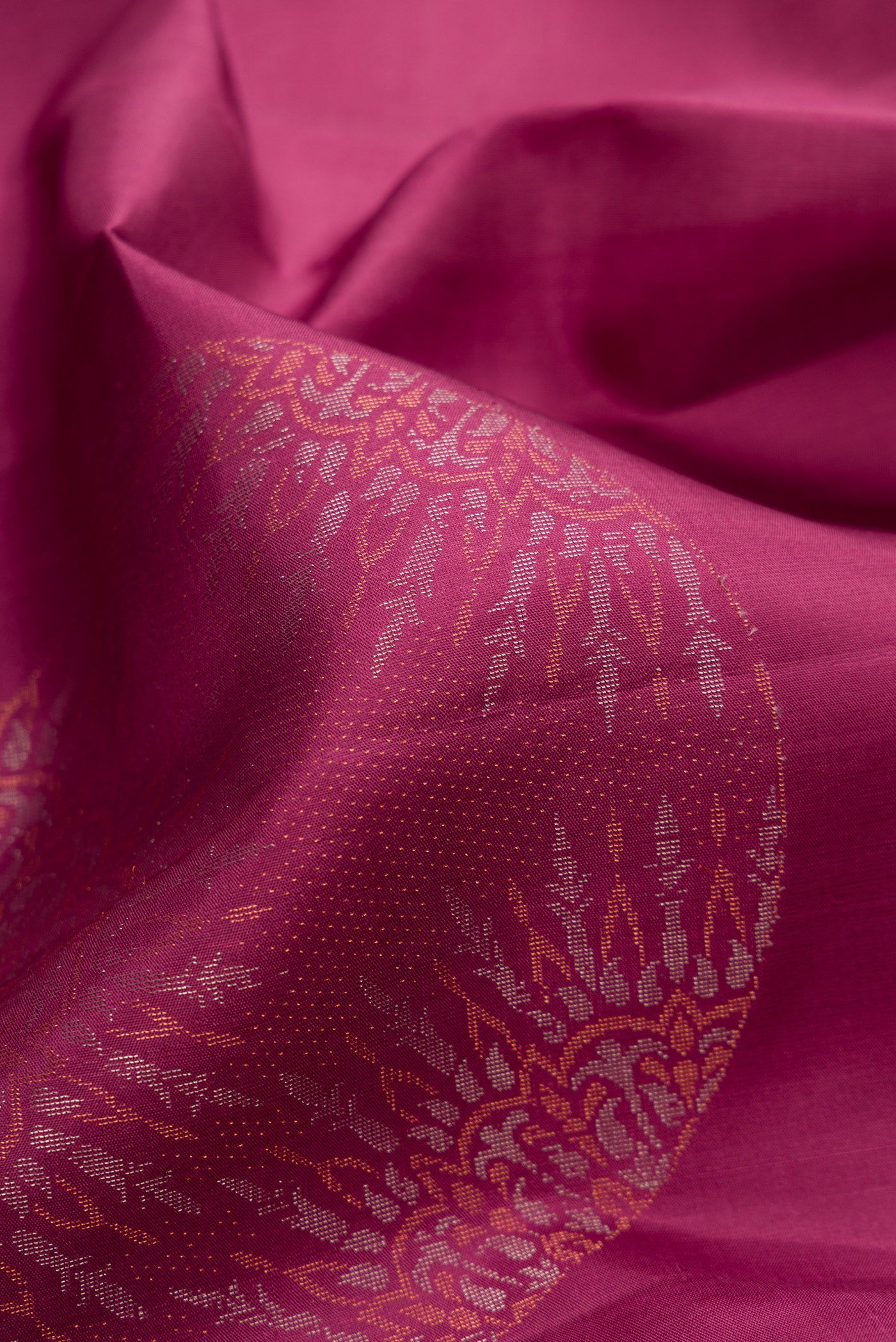 Close up of Mauve Soft Silk Saree with Zari Butta on the body and Without Border.  displaying folds