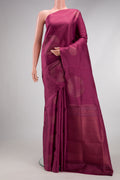 Mauve Soft Silk Saree with Zari Butta on the body and Without Border.  displayed on a mannequin