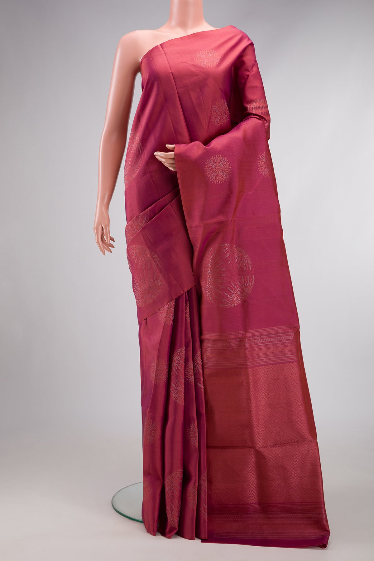 Mauve Dual Tone Soft Silk Saree with Zari Butta on the body and Without Border.  displayed on a mannequin