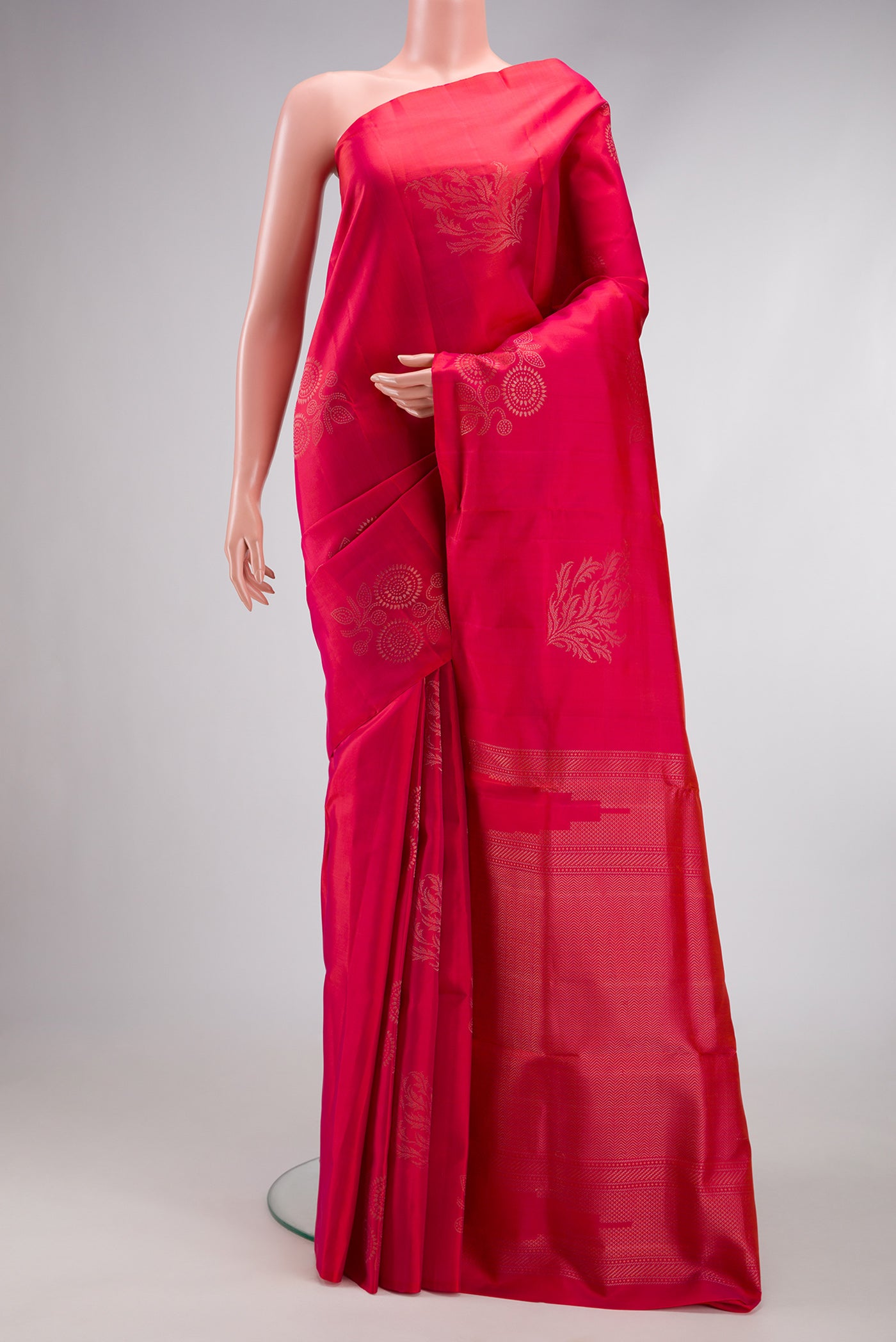 Pink Dual Tone Soft Silk Saree with Zari Butta on the body and Without Border.  displayed on a mannequin