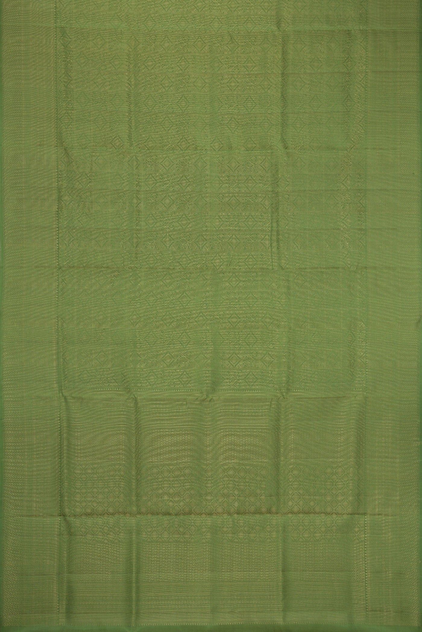 Flat view of Green Soft Silk Saree with Zari Brocade on the body and Fancy Border. 