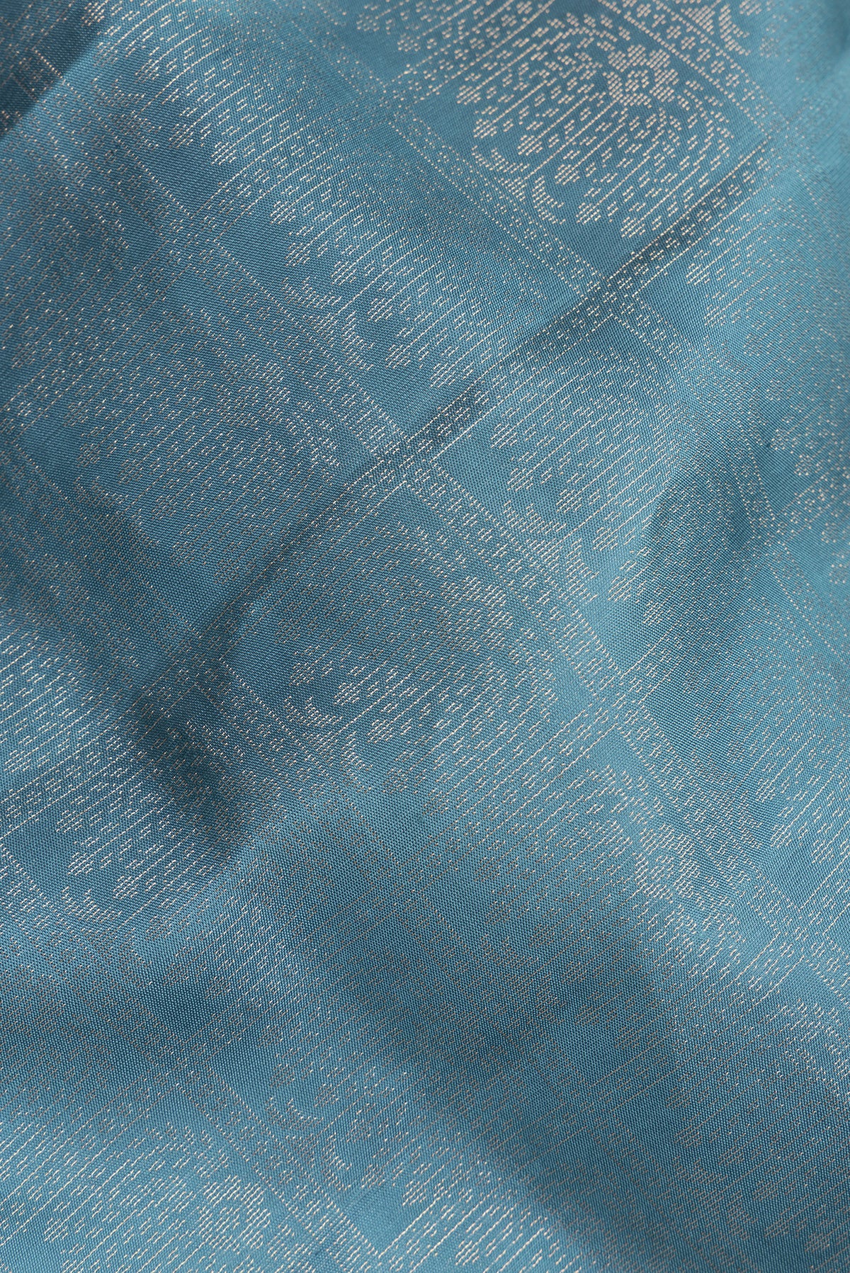 Close up of Pure Silk Blue Grey Soft Saree with Zari Brocade on the body and Fancy Border.  displaying folds