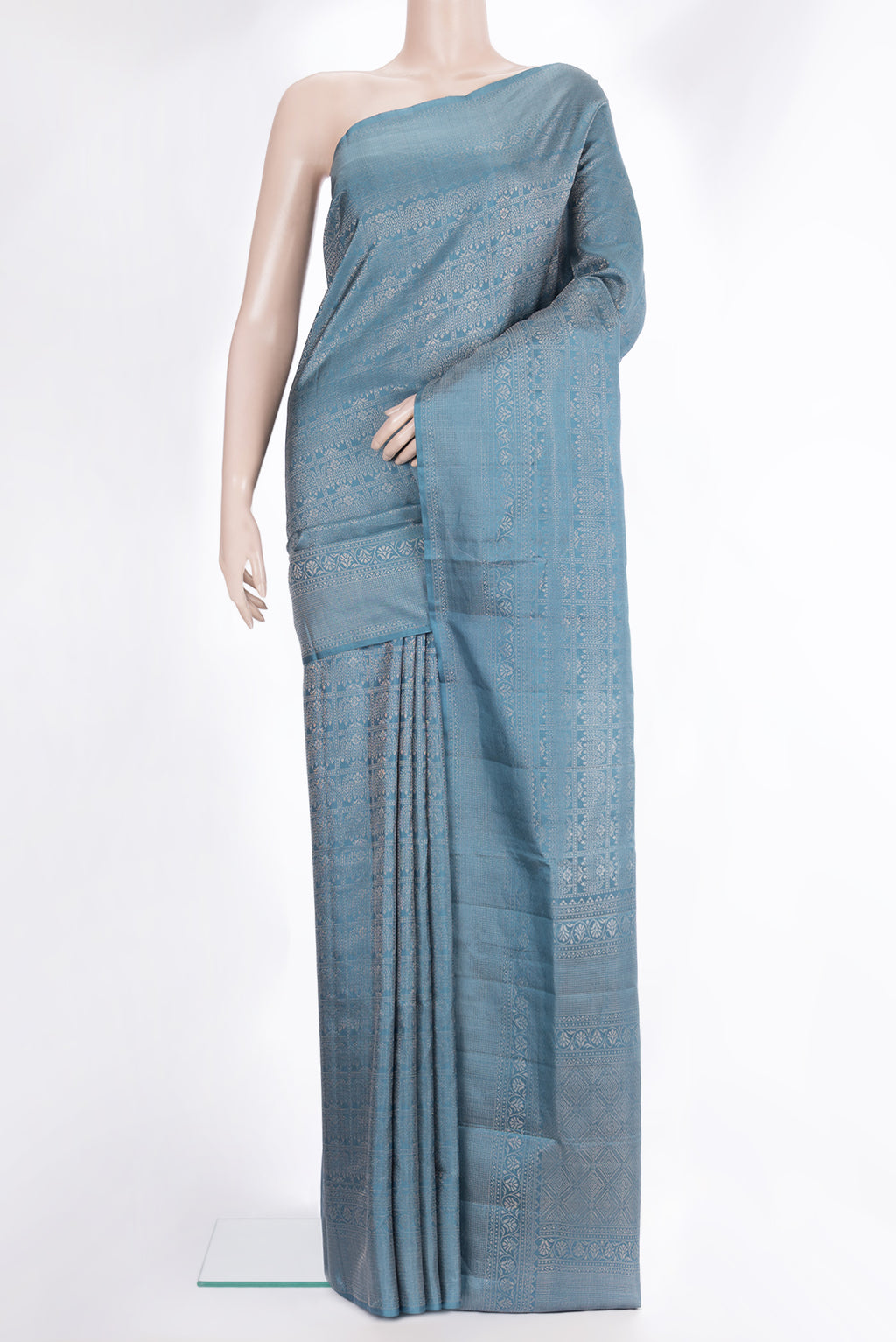 Pure Silk Blue Grey Soft Saree with Zari Brocade on the body and Fancy Border.  displayed on a mannequin