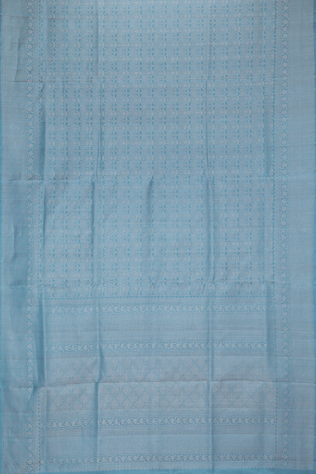 Flat view of Pure Silk Blue Grey Soft Saree with Zari Brocade on the body and Fancy Border. 