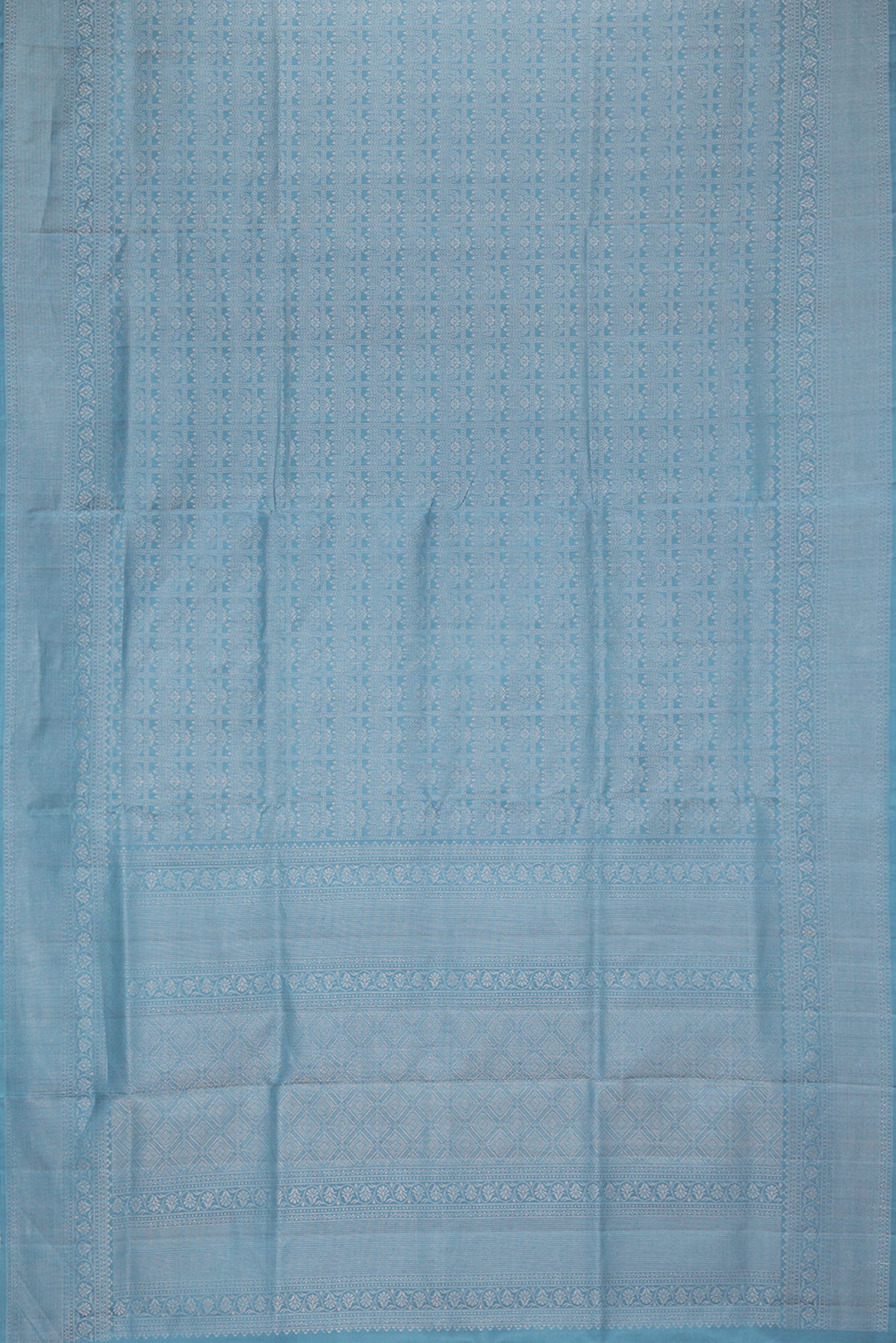 Flat view of Pure Silk Blue Grey Soft Saree with Zari Brocade on the body and Fancy Border. 
