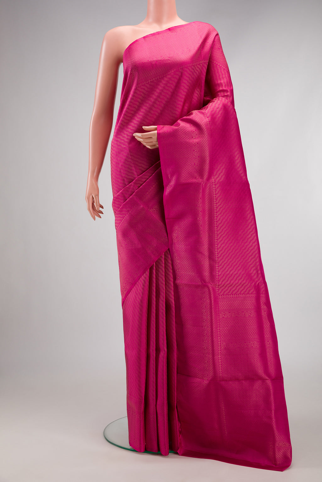 Pink Soft Silk Saree with Zari Brocade on the body and Fancy Border.  displayed on a mannequin