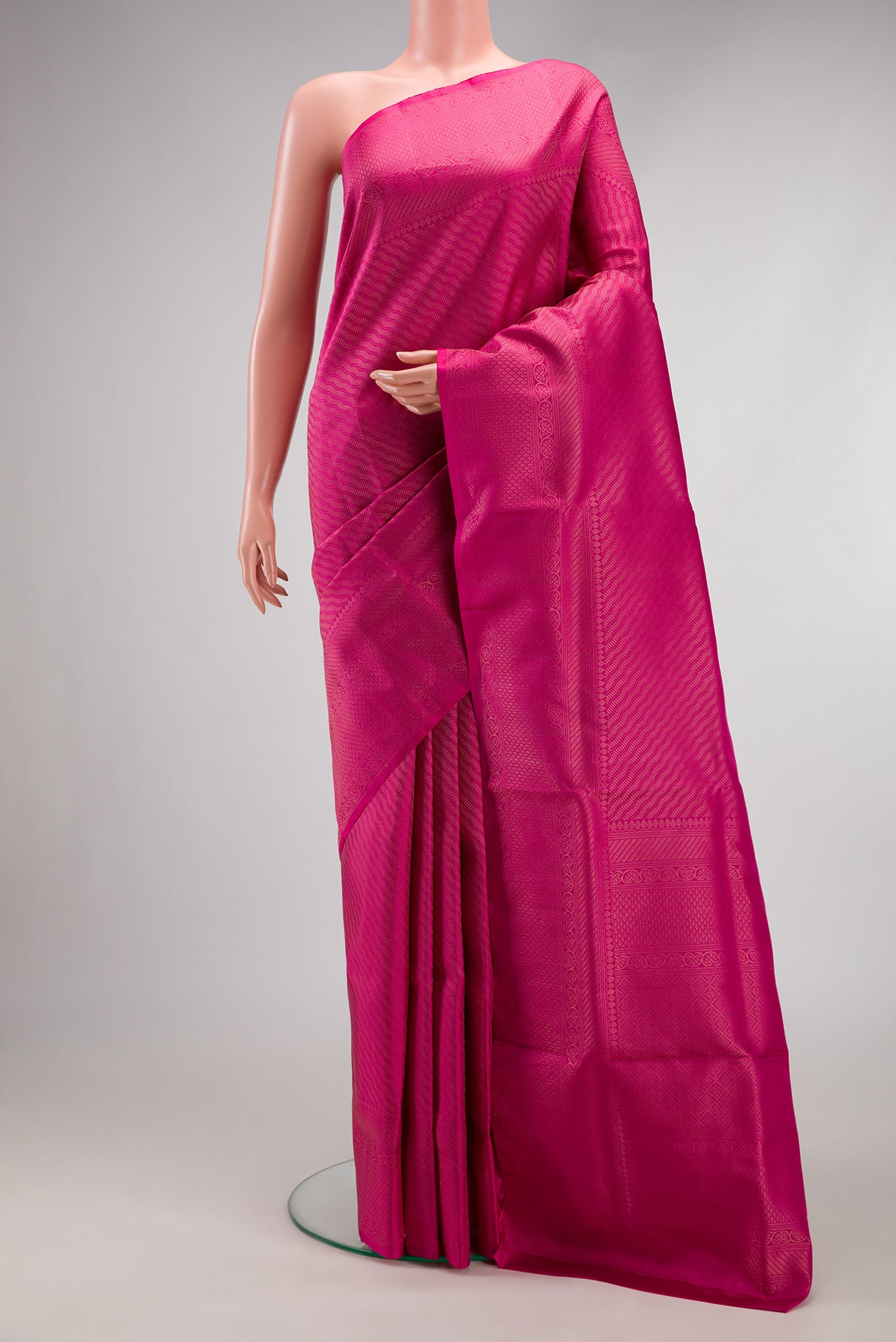 Pink Soft Silk Saree with Zari Brocade on the body and Fancy Border.  displayed on a mannequin