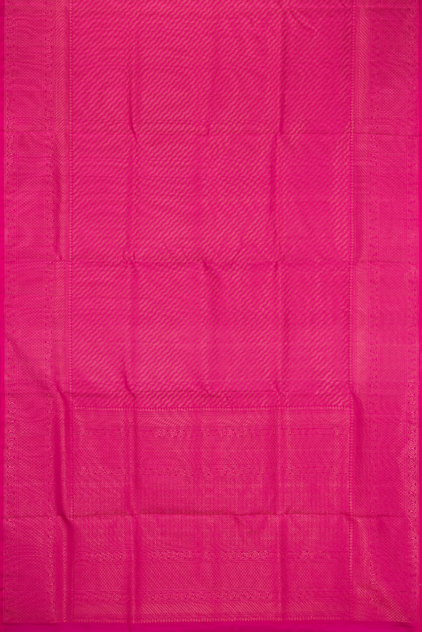 Flat view of Pink Soft Silk Saree with Zari Brocade on the body and Fancy Border. 