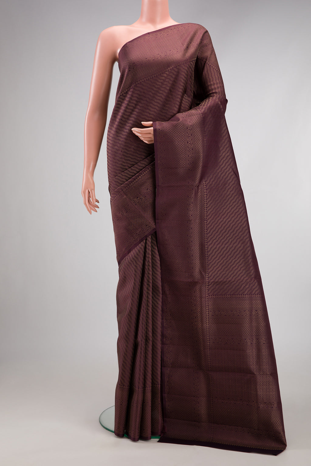Burgundy Dual Tone Soft Silk Saree with Zari Brocade on the body and Fancy Border.  displayed on a mannequin