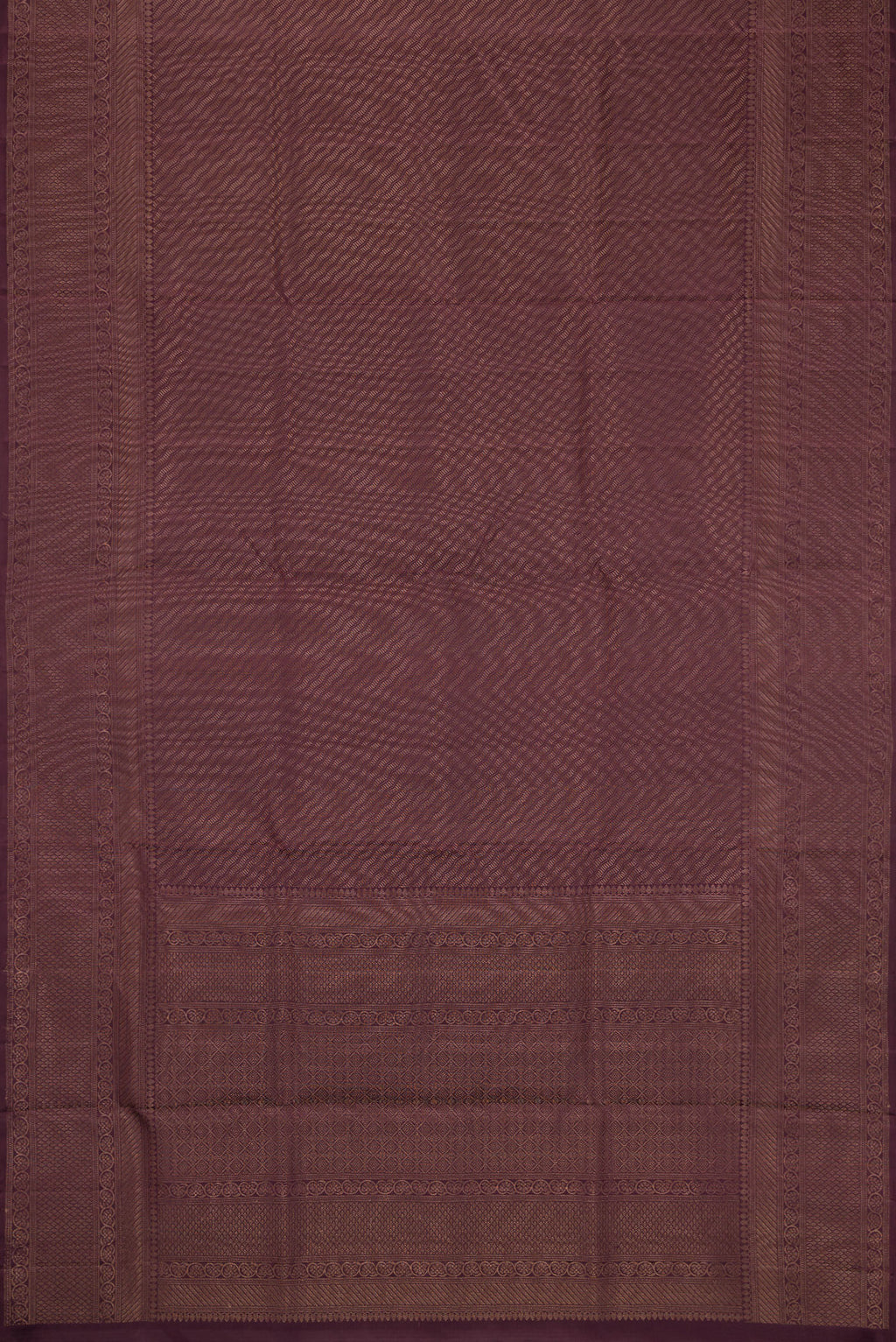 Flat view of Burgundy Dual Tone Soft Silk Saree with Zari Brocade on the body and Fancy Border. 