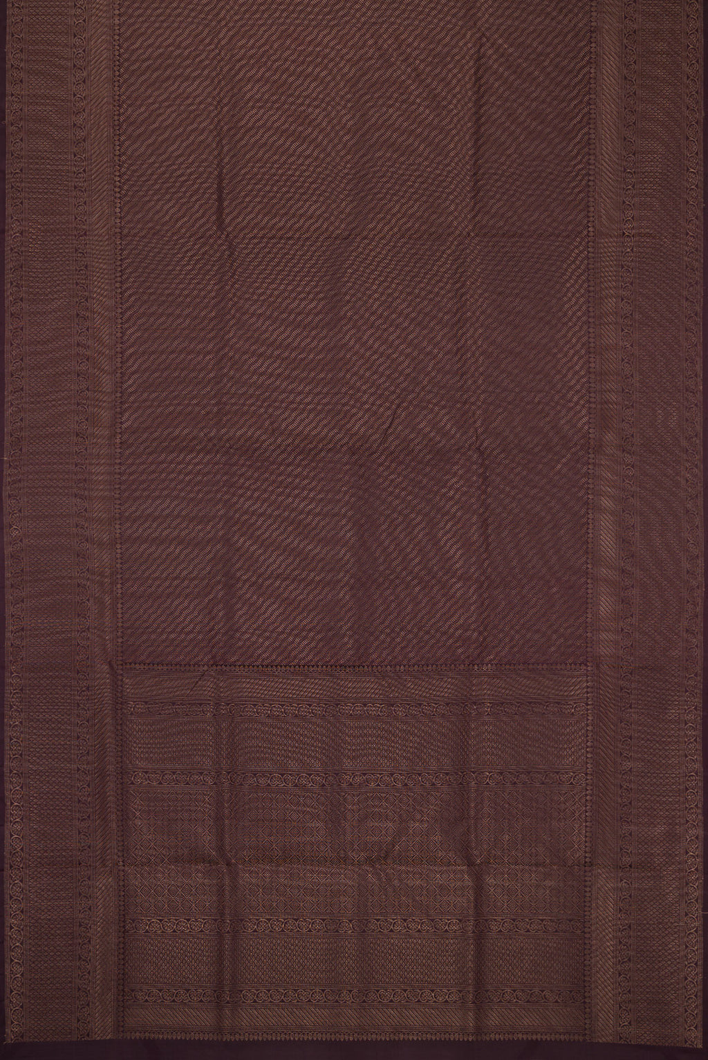 Flat view of Burgundy Soft Silk Saree with Zari Brocade on the body and Fancy Border. 