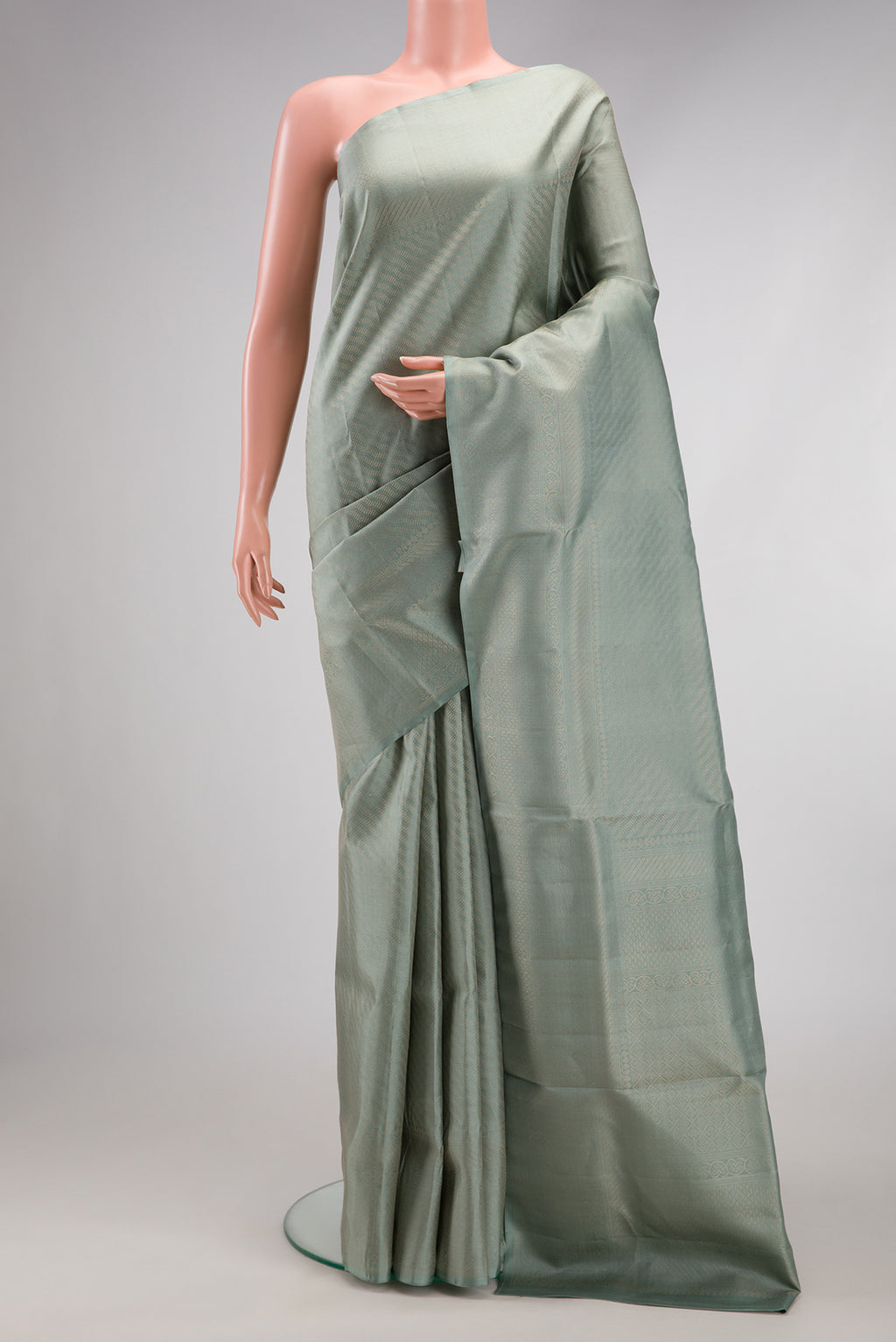 Light Blue Dual Tone Soft Silk Saree with Zari Brocade on the body and Fancy Border.  displayed on a mannequin