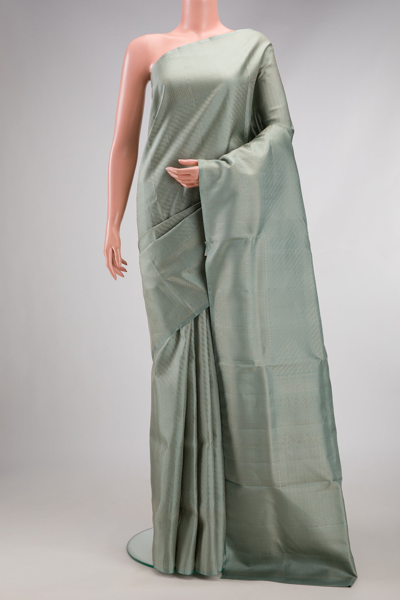Light Blue Dual Tone Soft Silk Saree with Zari Brocade on the body and Fancy Border.  displayed on a mannequin