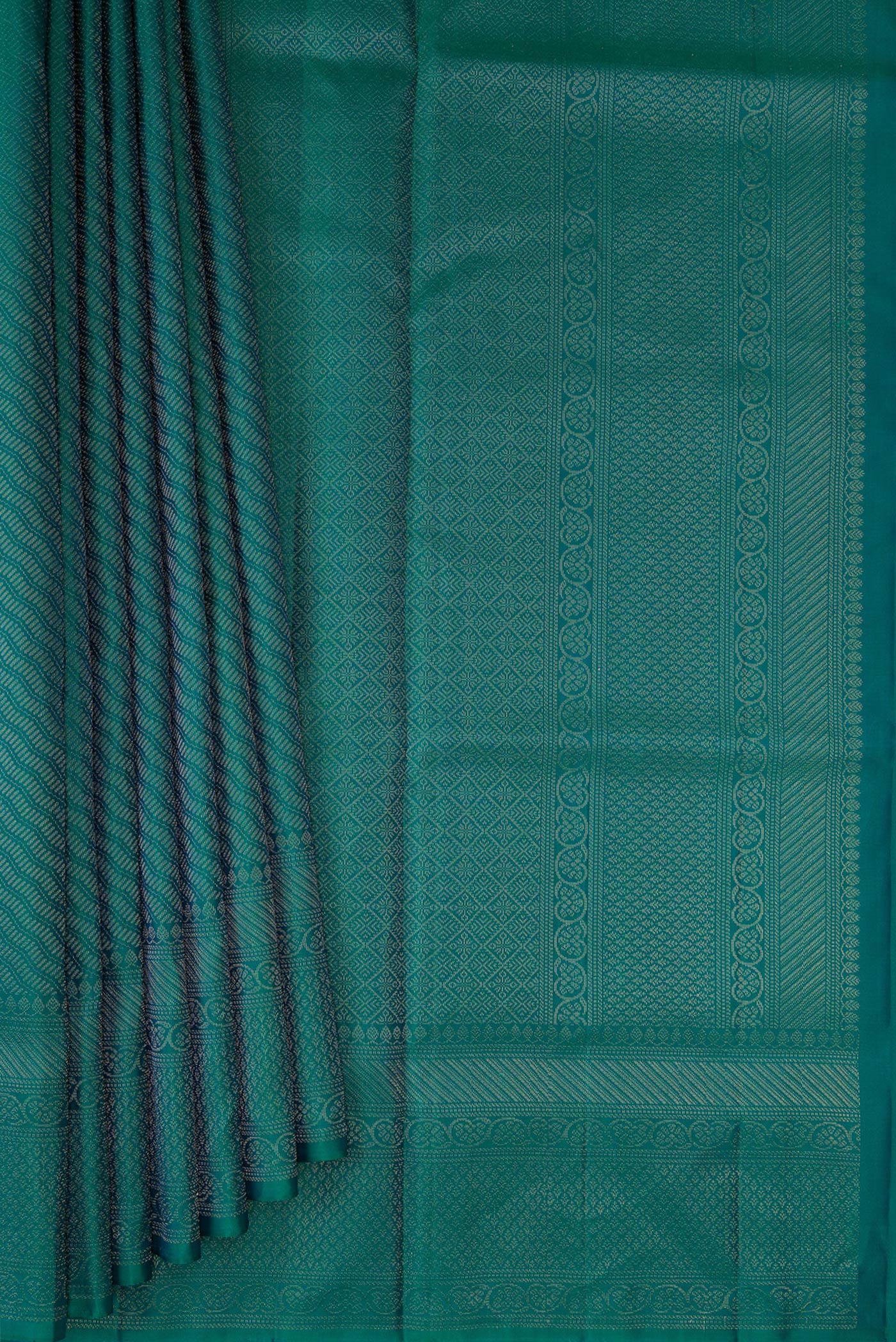 Pleats and pallu of Peacock Blue Dual Tone Soft Silk Saree with Zari Brocade on the body and Fancy Border. 