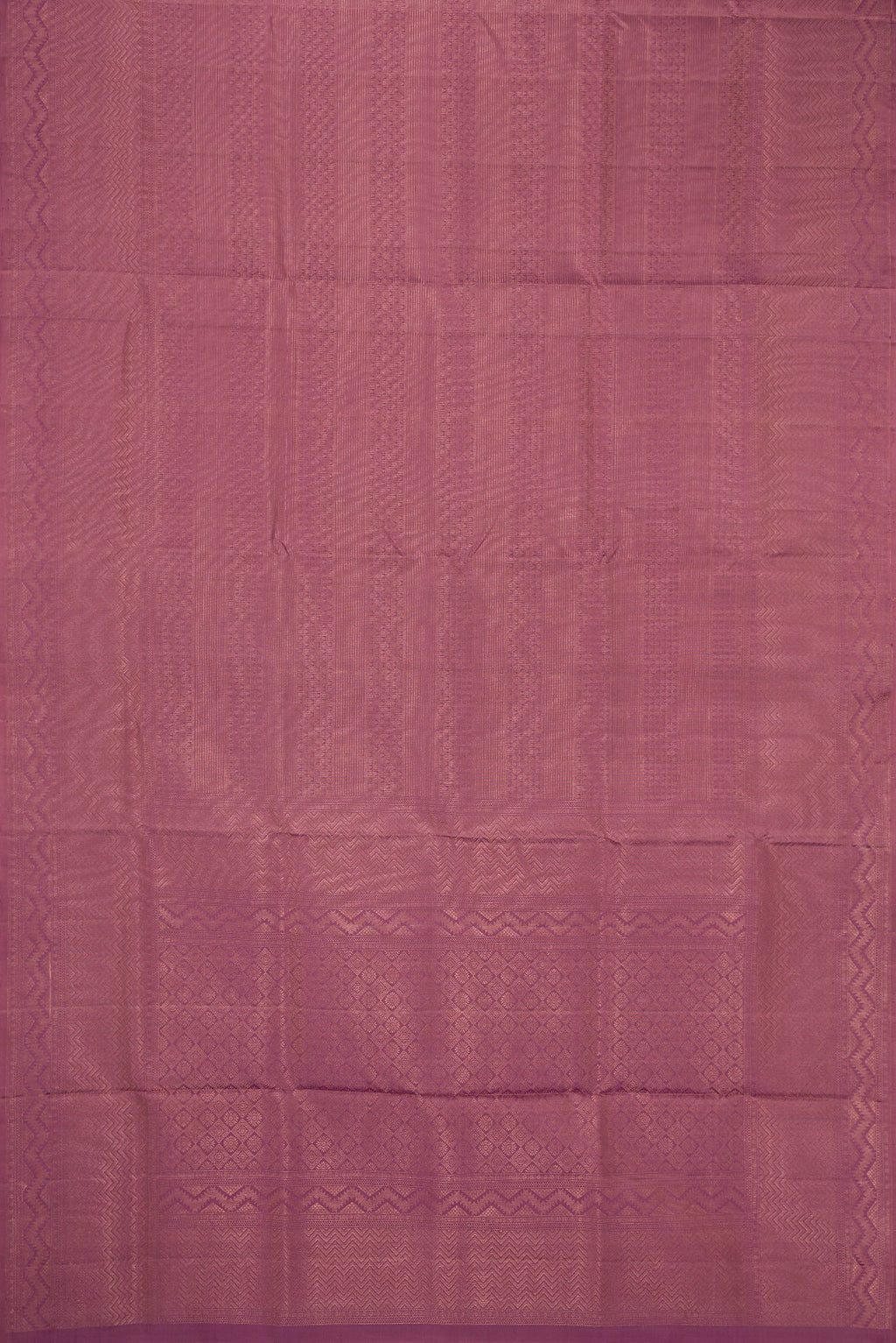 Flat view of Purple Soft Silk Saree with Zari Brocade on the body and Fancy Border. 