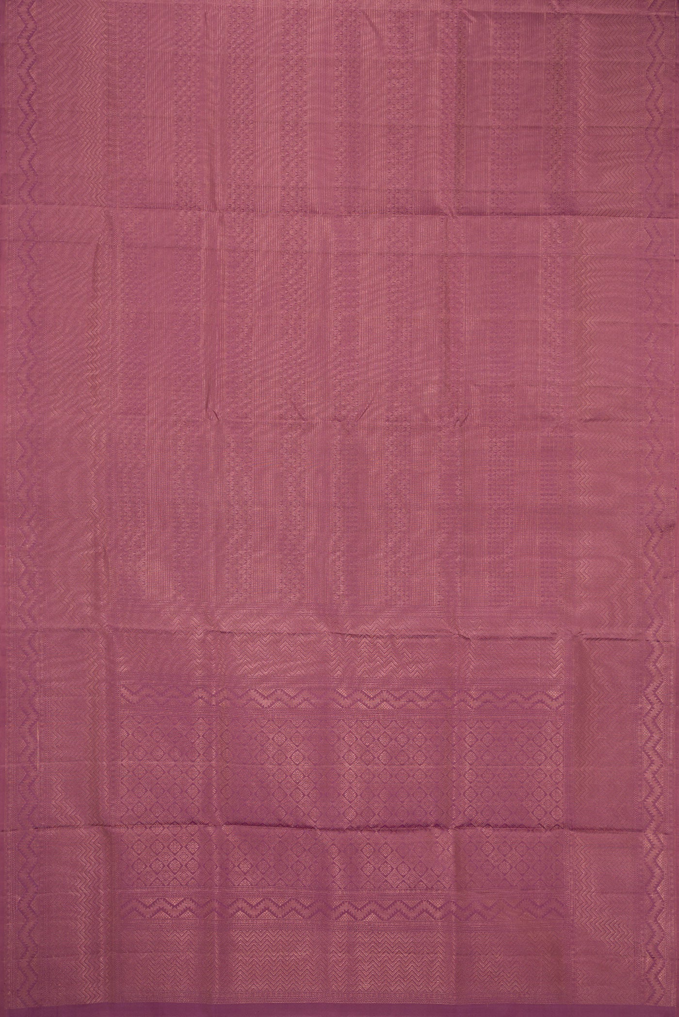 Flat view of Purple Soft Silk Saree with Zari Brocade on the body and Fancy Border. 