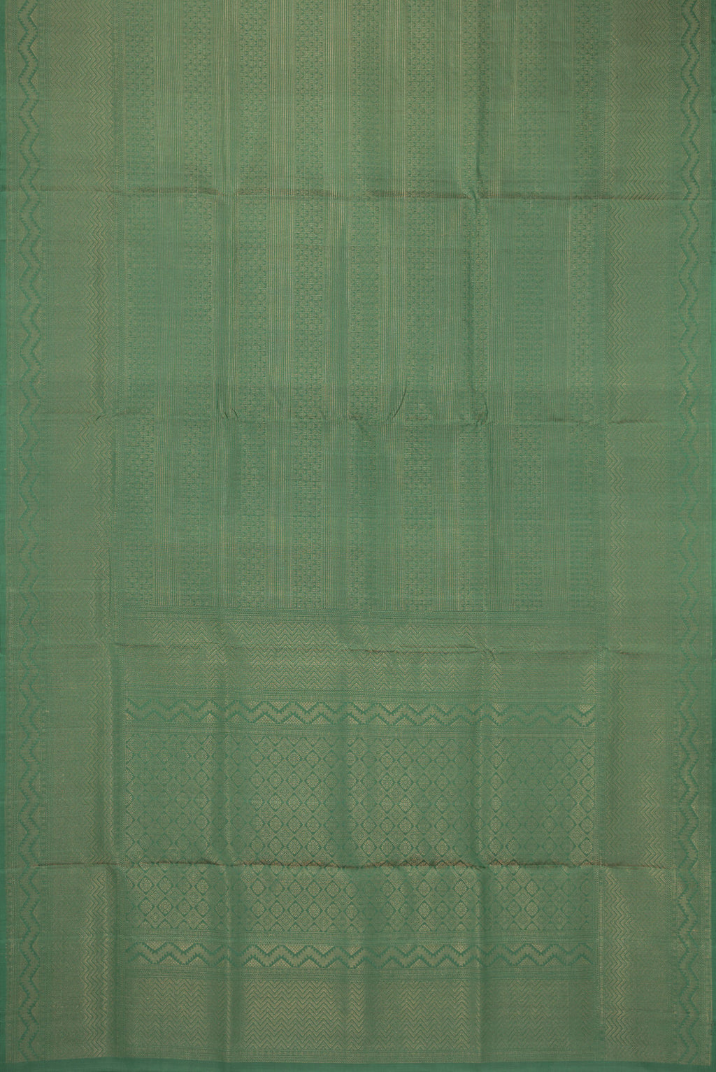 Flat view of Green Soft Silk Saree with Zari Brocade on the body and Fancy Border. 
