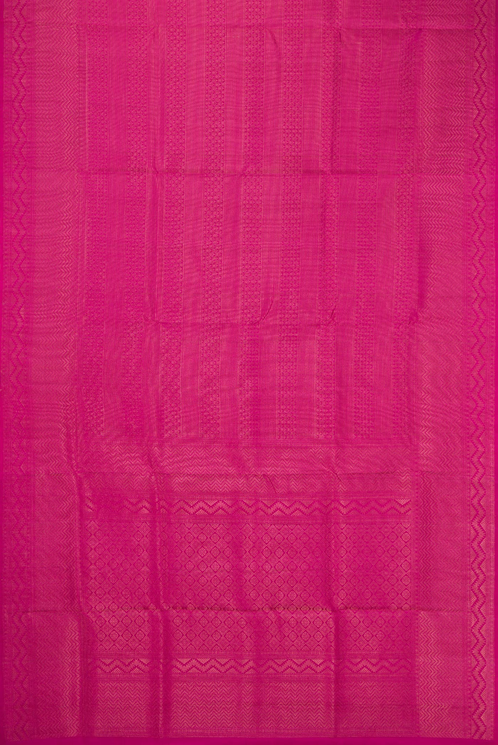 Flat view of Magenta Soft Silk Saree with Zari Brocade on the body and Fancy Border. 